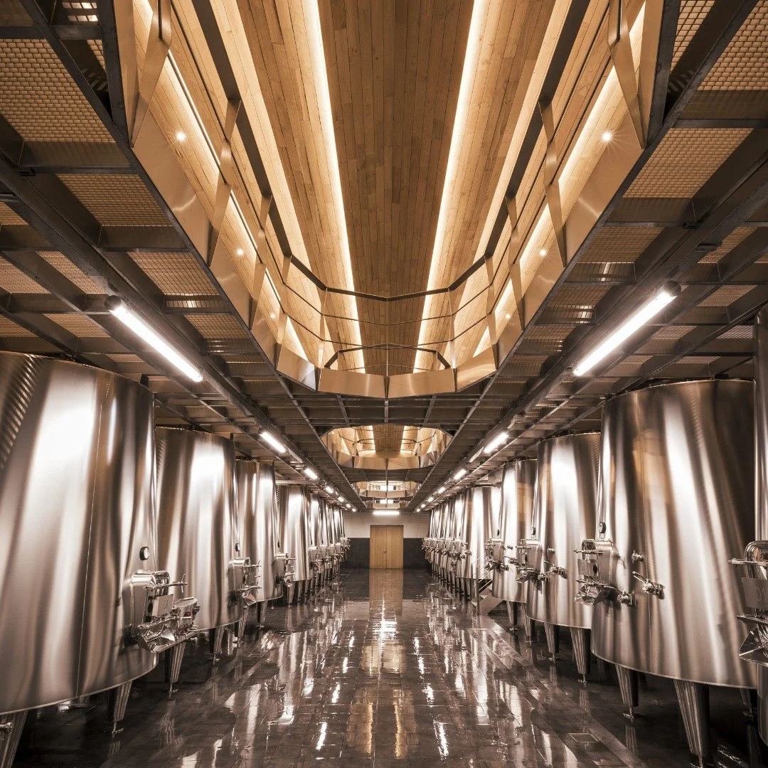 THE SECRET LANGUAGE OF THE CELLARS 

From the cellar to the tasting room, every step is a celebration.
Wine awakens as it leaves the vats, aromas unfurl, and a quiet reverence embraces the blending.
At @chateautroplongmondot , the art of wine is live