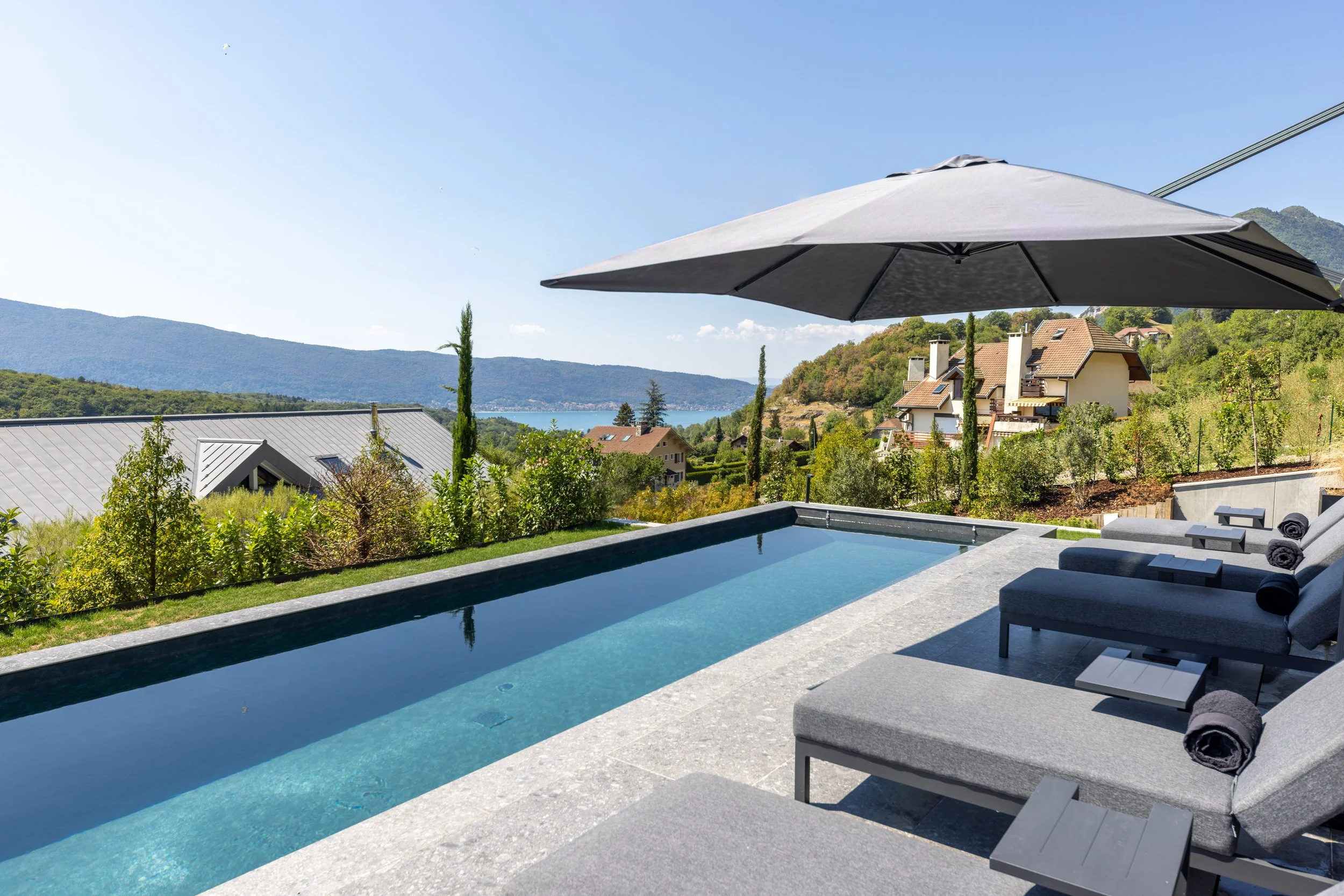 Swimming pool with view over Lake Annecy