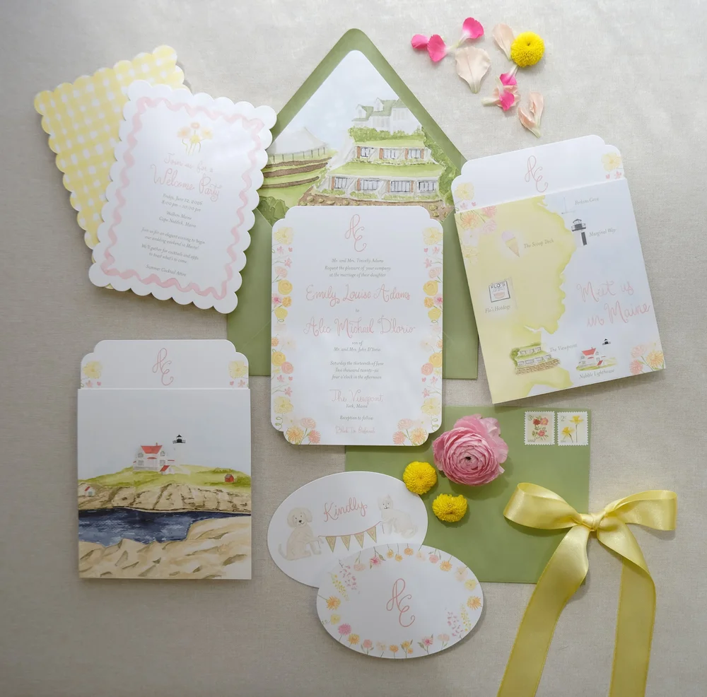 Pink, yellow and green floral invitation collection with scalloped cards, a watercolor map and yellow ribbon