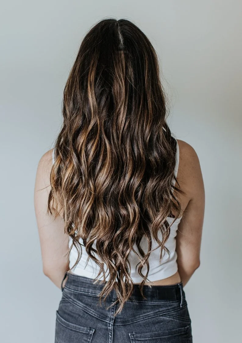 After Shot Showing the Back of a Model's Hair Wearing our 18" Ultra Seamless Clip In Extensions