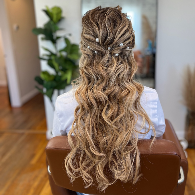 Image showing a model's hair all styled and blended seamlessly with Barely Xtensions Ultra Seamless Clip In Extensions