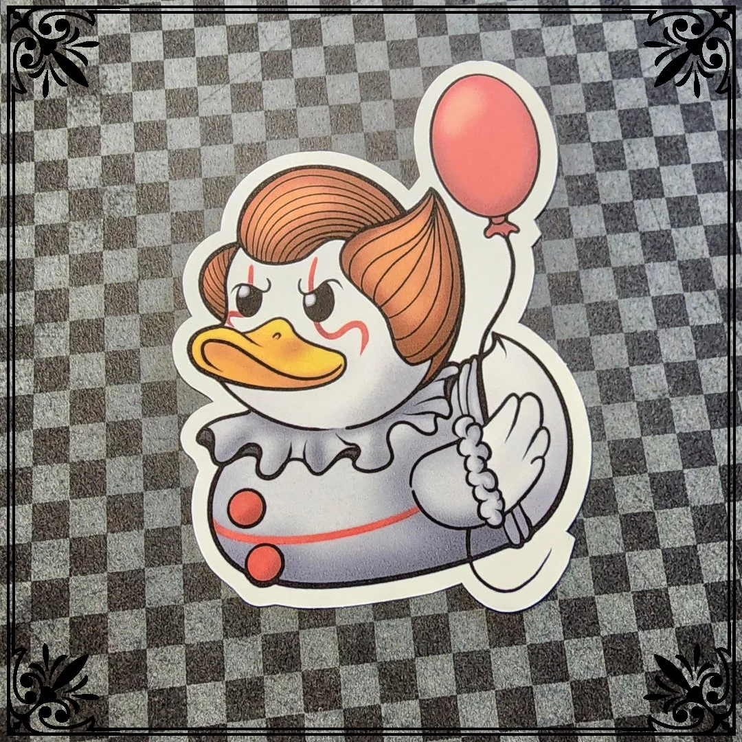 A cartoon-style sticker of a duck dressed as Pennywise the clown, holding a pink balloon, with a checkered background.