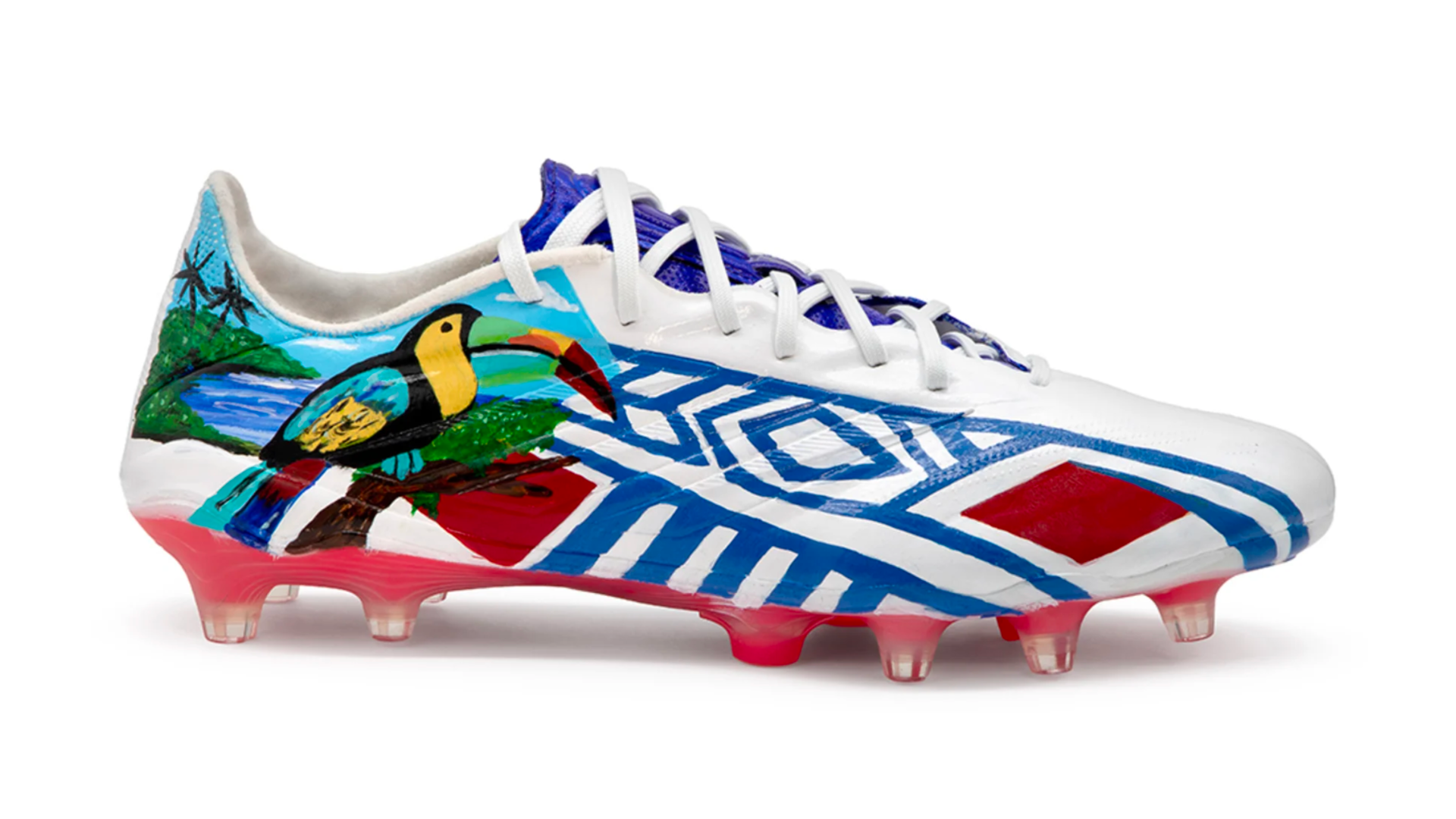 Hand-painted soccer cleats for Belize by artist Alexandra Seda, also known as Miss Lushy, featuring the keel-billed toucan and Garifuna-inspired patterns, Kicks of Concacaf, FIFA World Cup 2026.
