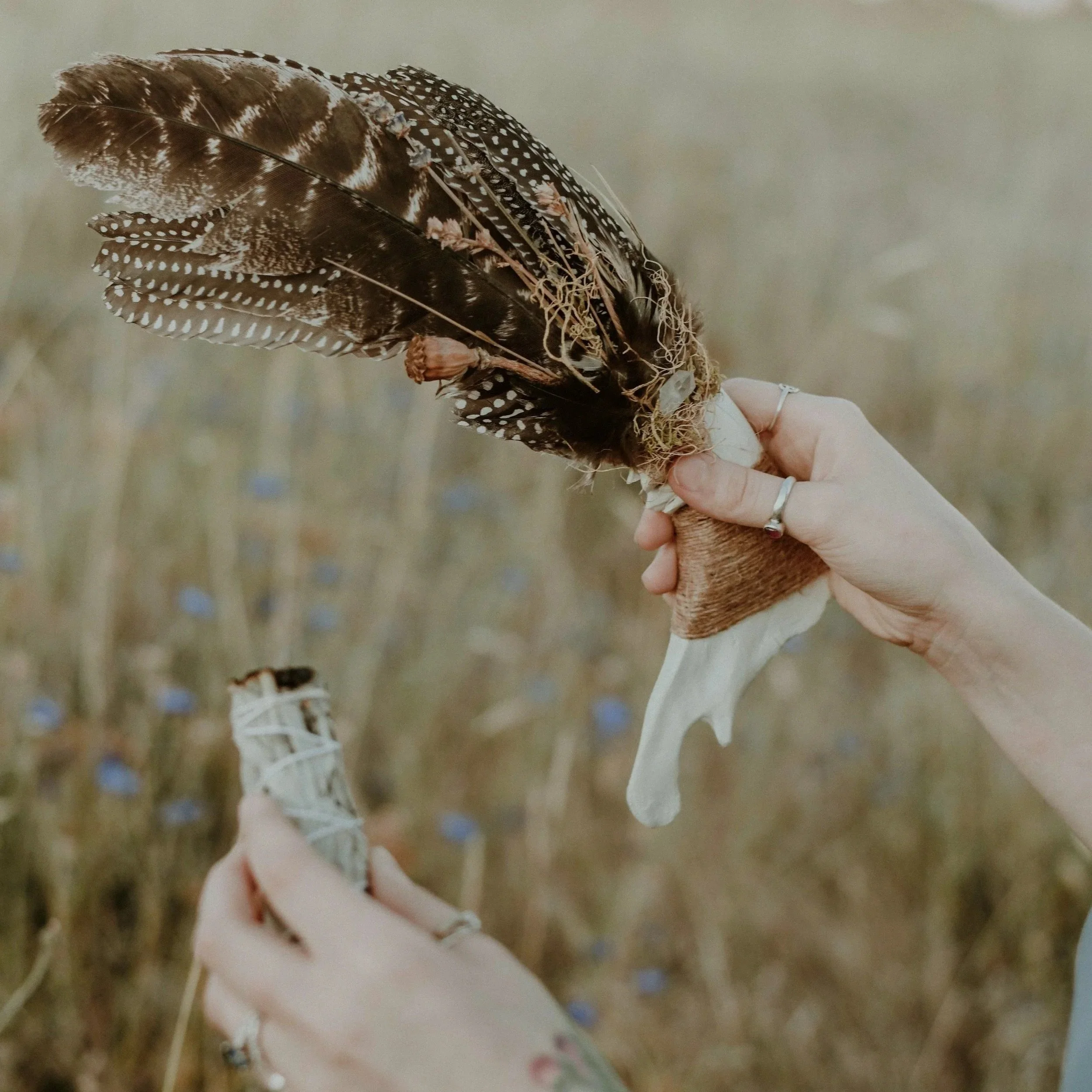 Emily Rose smiling softly, offering trauma-informed somatic and spiritual support