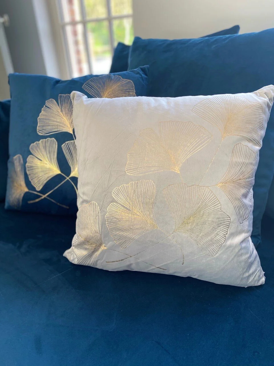 navy silver cushions