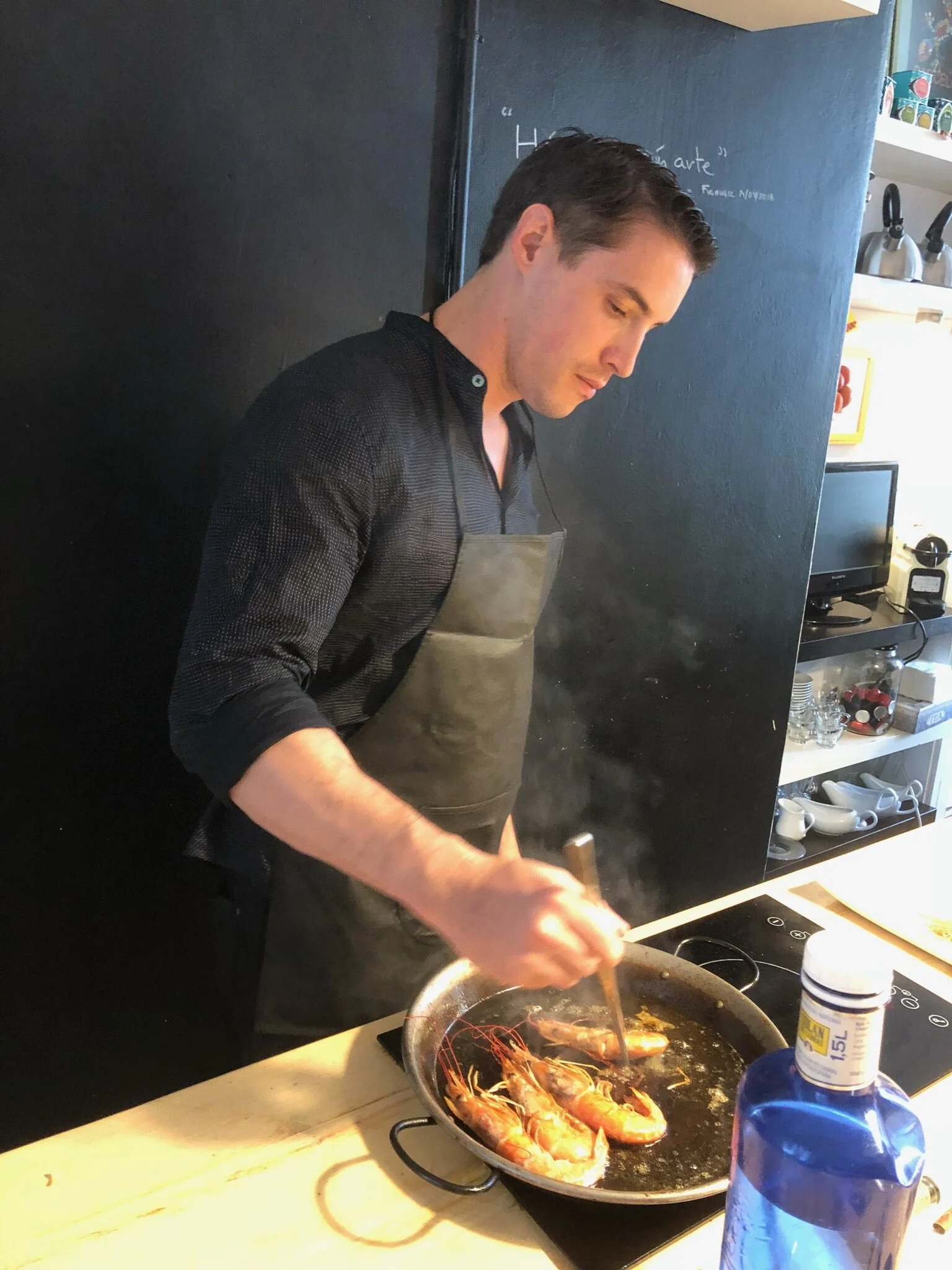 Dr. Ryan taking a cooking class.