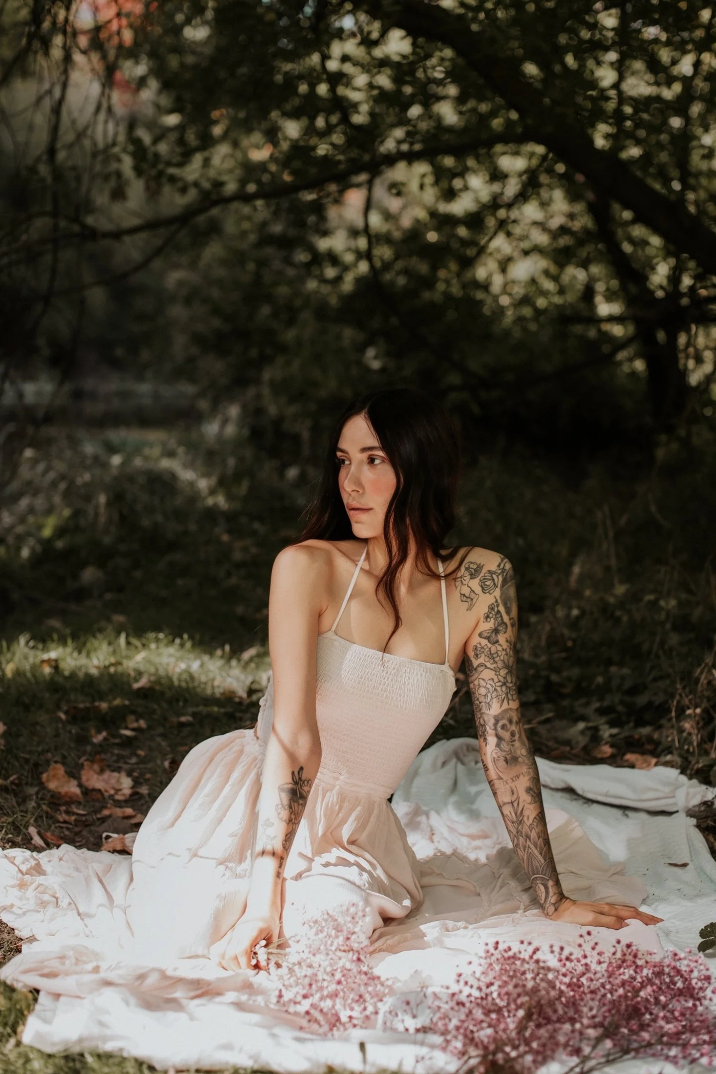 Facesbykatey from Mindful Beauty posing for a photo in a bathtub.