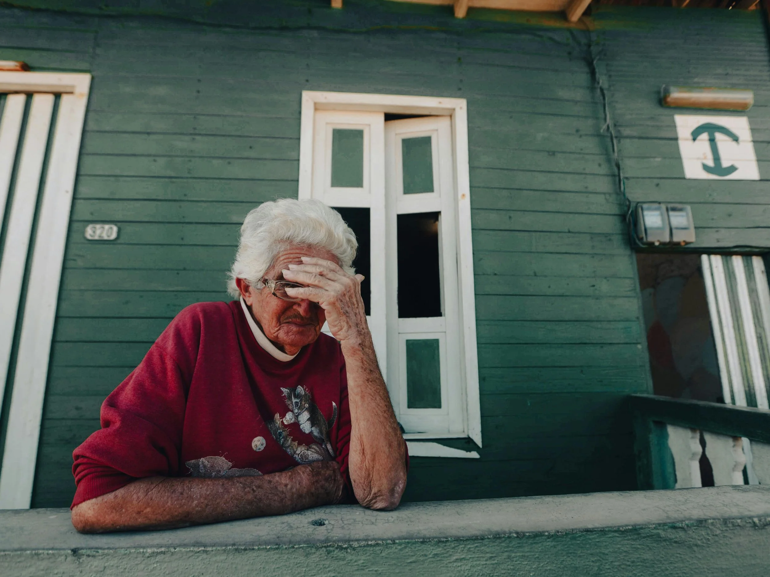 A woman outside who looks confused.