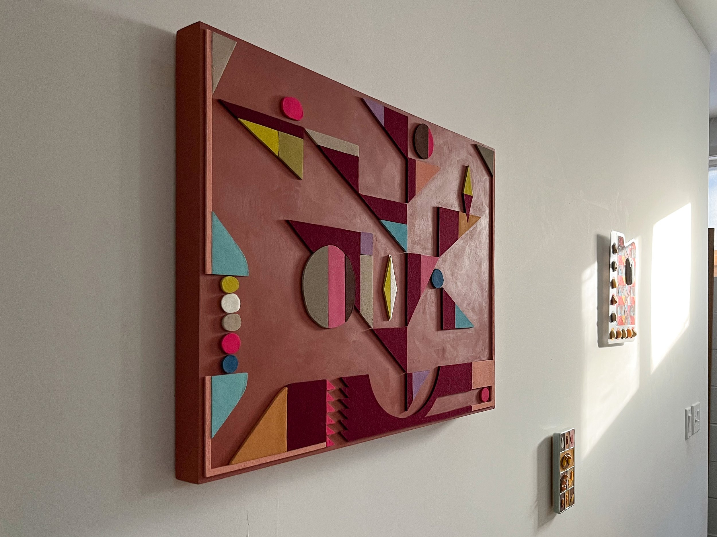 untitled (01.2025), 2025 • Felt, homemade sculpting compound, chalk paint and wax on panel • Height: 18”, Width: 24”