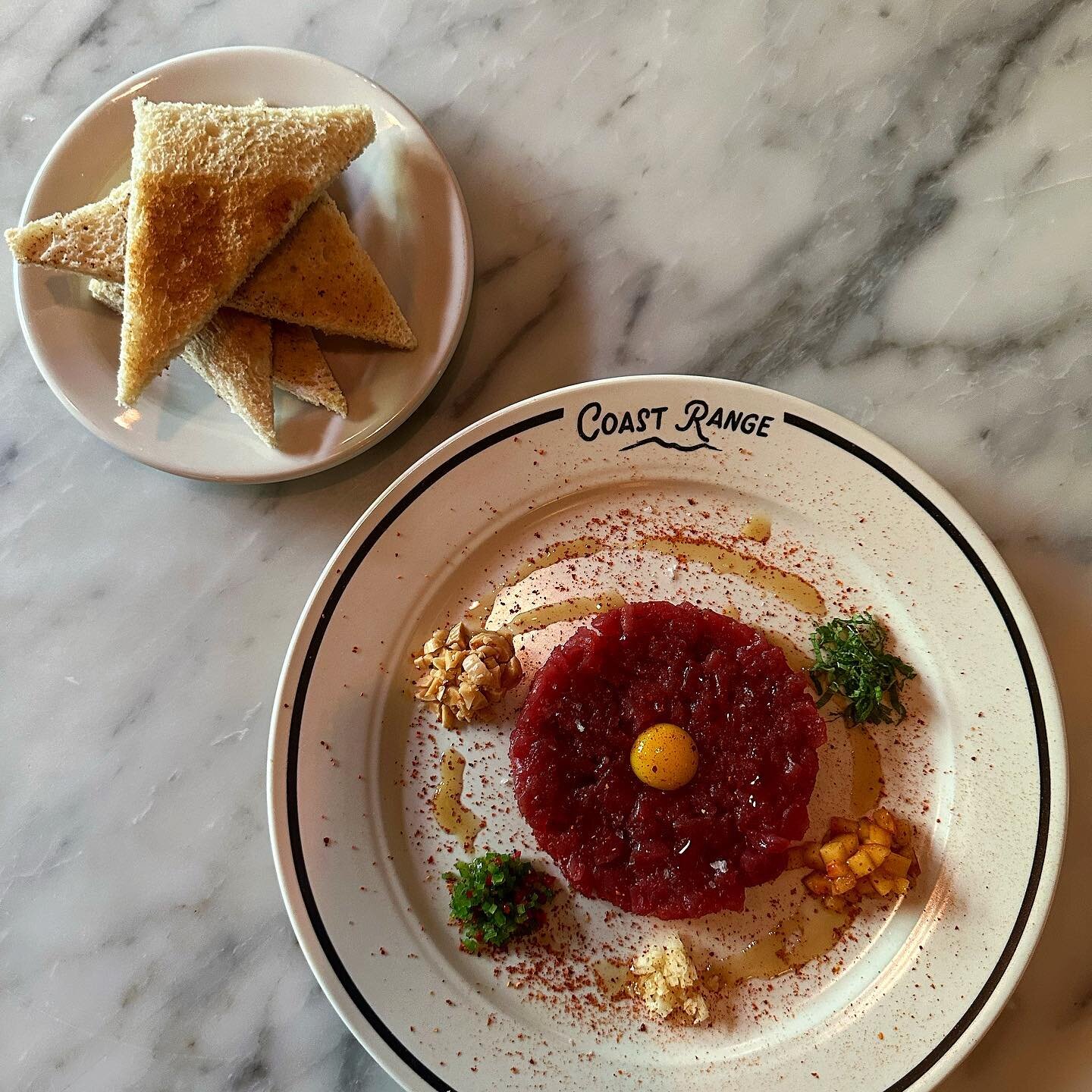 Tuna Tartare, Peach, Mint, Garlic, Marcona Almonds, Quail Egg

Mixed table side.