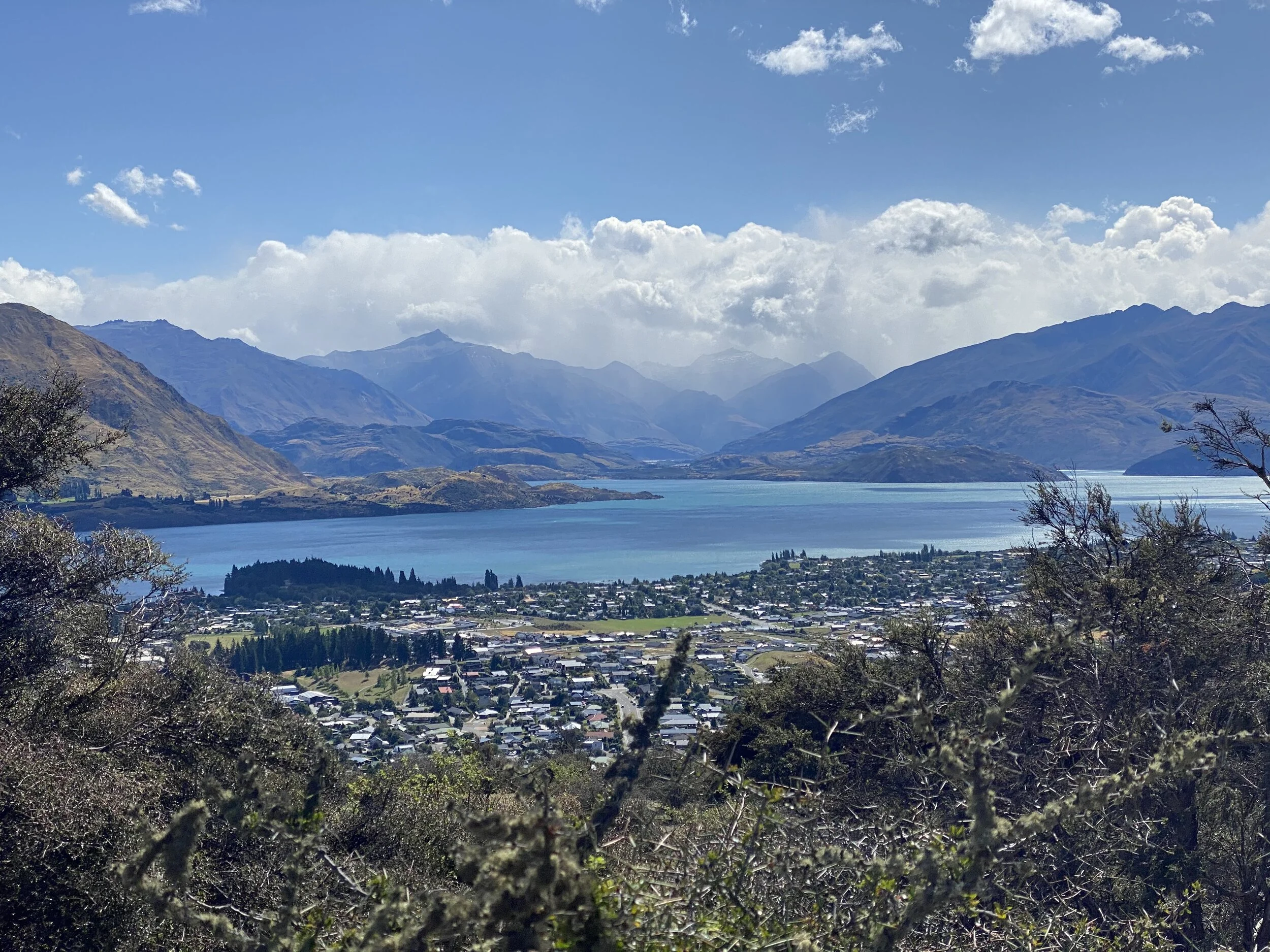 The view of Wanaka, Lake Wanaka and the Southern Alps from Mount Iron.
