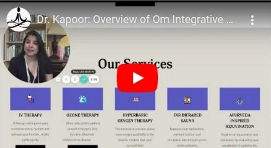 Screenshot of a YouTube video titled 'Dr. Kapoor: Overview of Om Integrative'. The video shows Dr. Kapoor presenting information about various integrative health services, including IV therapy, ozone therapy, hyperbaric oxygen therapy, far infrared sauna, and Ayurveda inspired rejuvenation. Her photo appears in a circular frame at the top left.