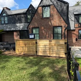 Wooden pool and HVAC equipment screen built in Avondale, Jacksonville, Florida, providing functional concealment while maintaining airflow and yard access.
