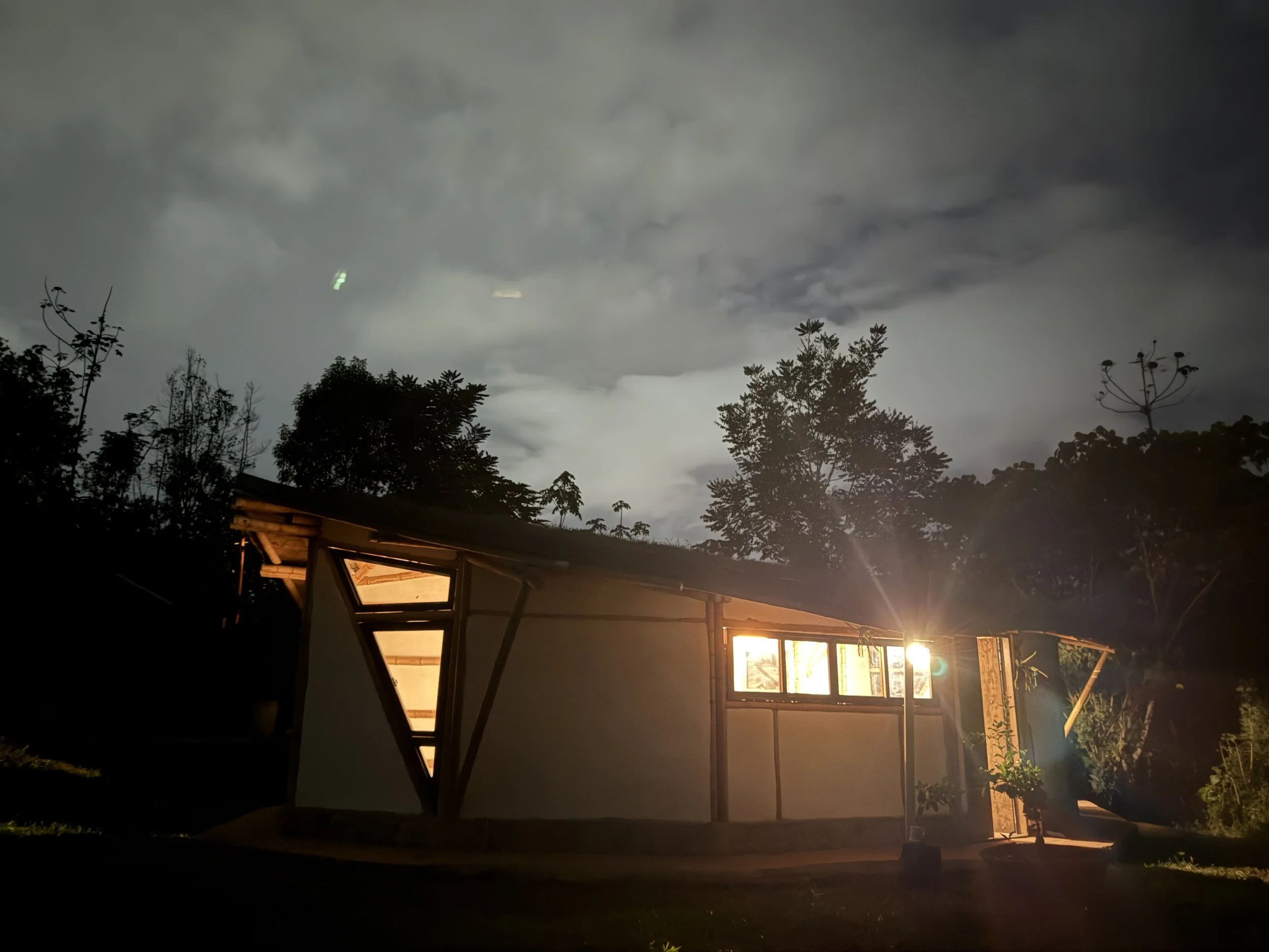 Andrés and Gisela’s home illuminated at night in Kaukitá.