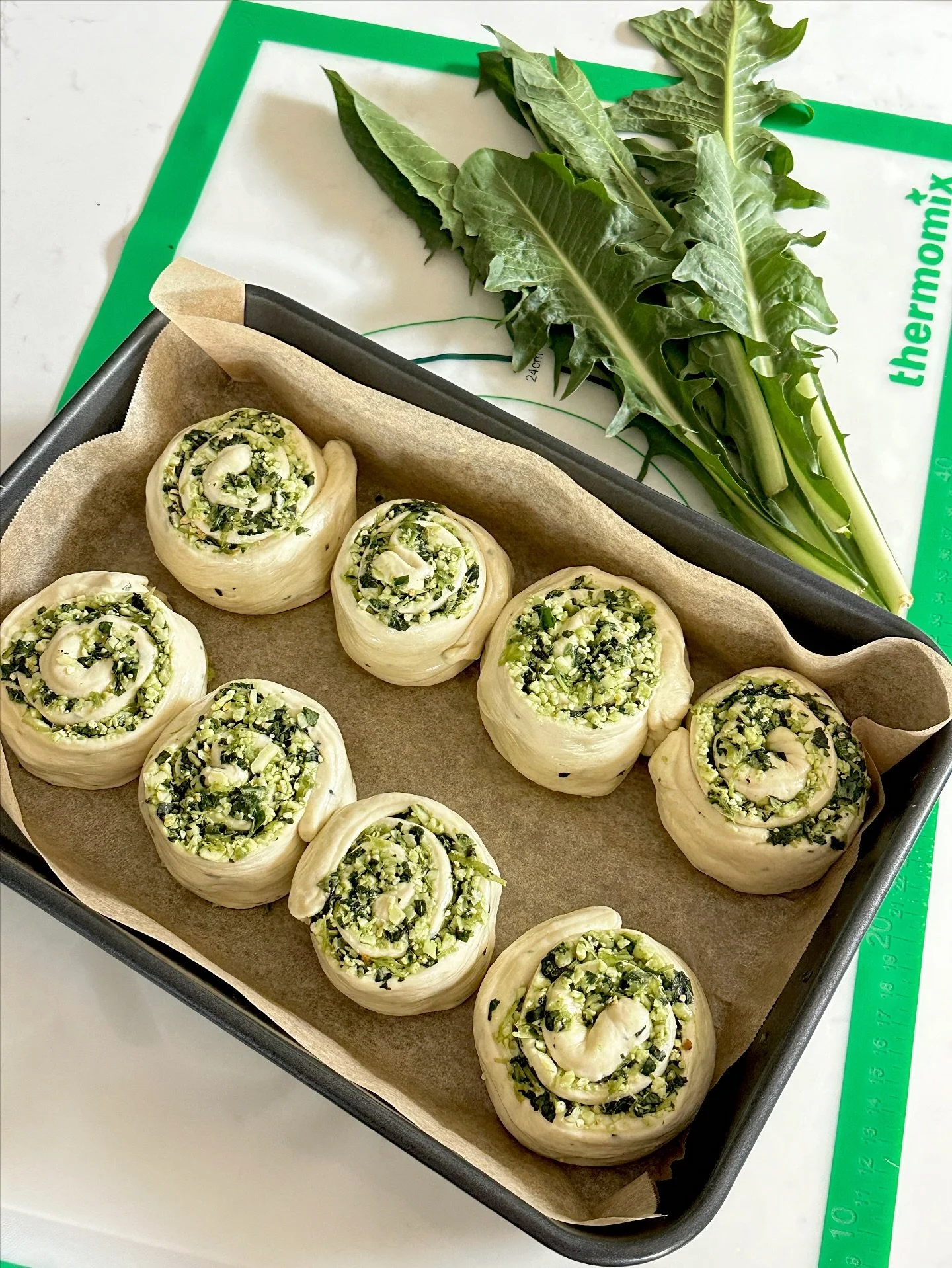 An old favourite, with a new spin! These three cheese and spinach scrolls are from the cookbook Everyday Cooking for Thermomix® Families, and also on Cookidoo®. Today I’ve swapped out the spinach for some chicory I had in the garden, an