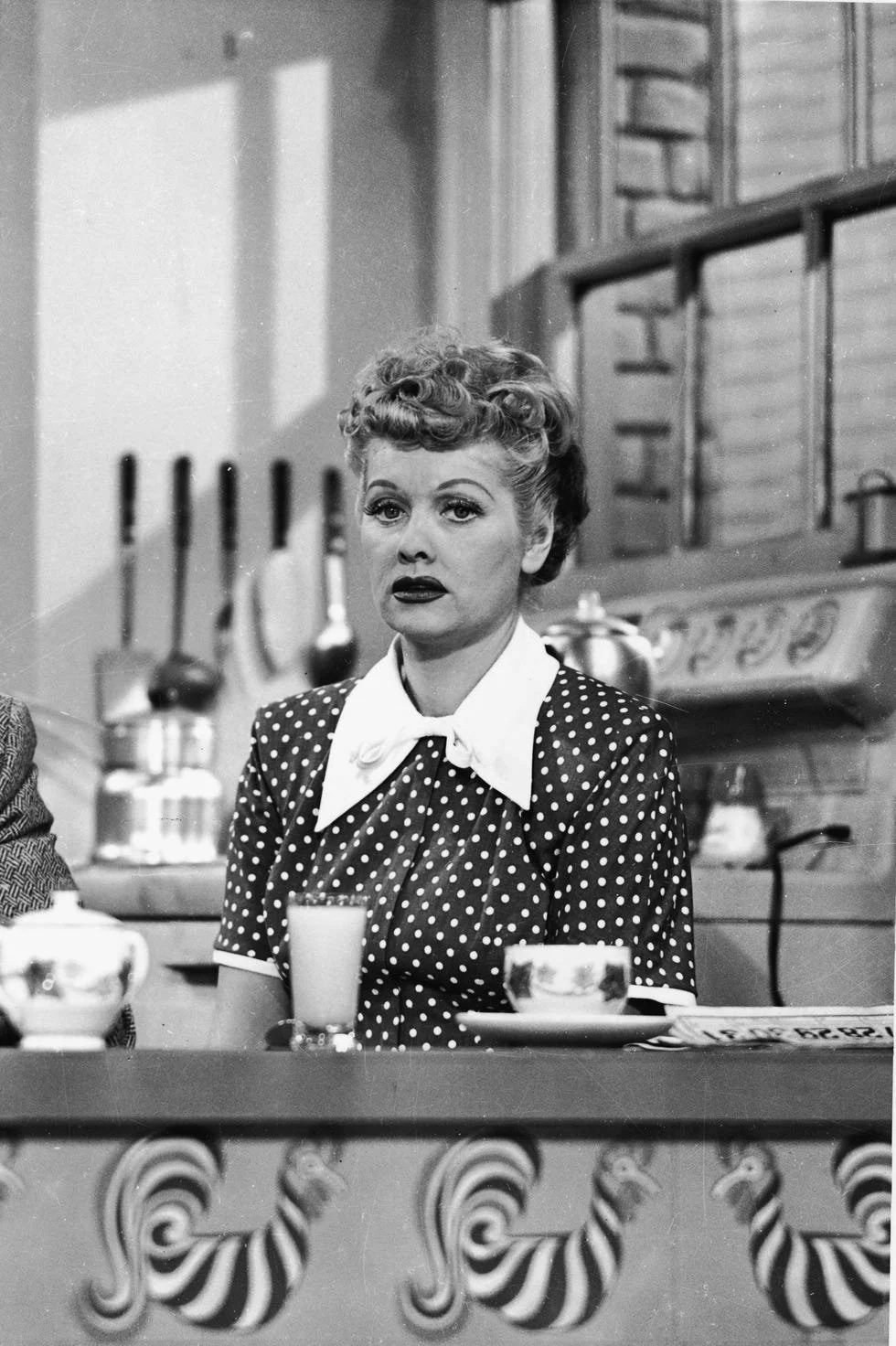 cuban-born-actor-desi-arnaz-sits-at-the-kitchen-table-and-news-photo-1592510351.jpeg