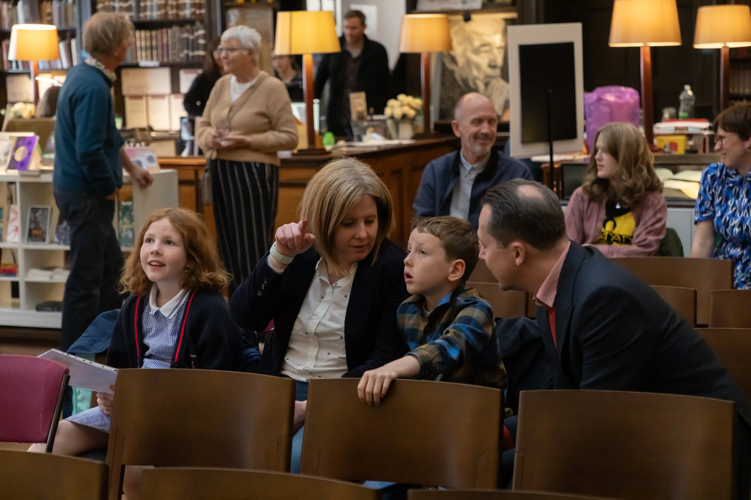 Emilia Rhodes family looking around.jpg