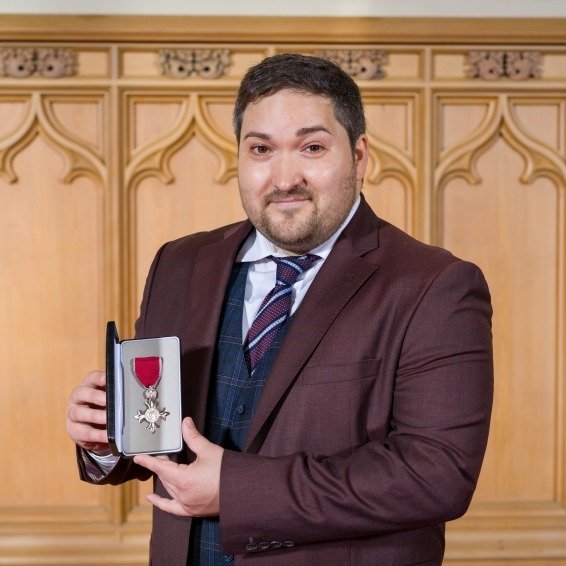 We are so incredibly proud to share that Oliver Sykes, a creative writing workshop leader for The Portico Sadie Massey Awards for Young Readers and Writers, has been awarded an MBE!

Oliver is a brilliant children's author, poet, facilitator, produce