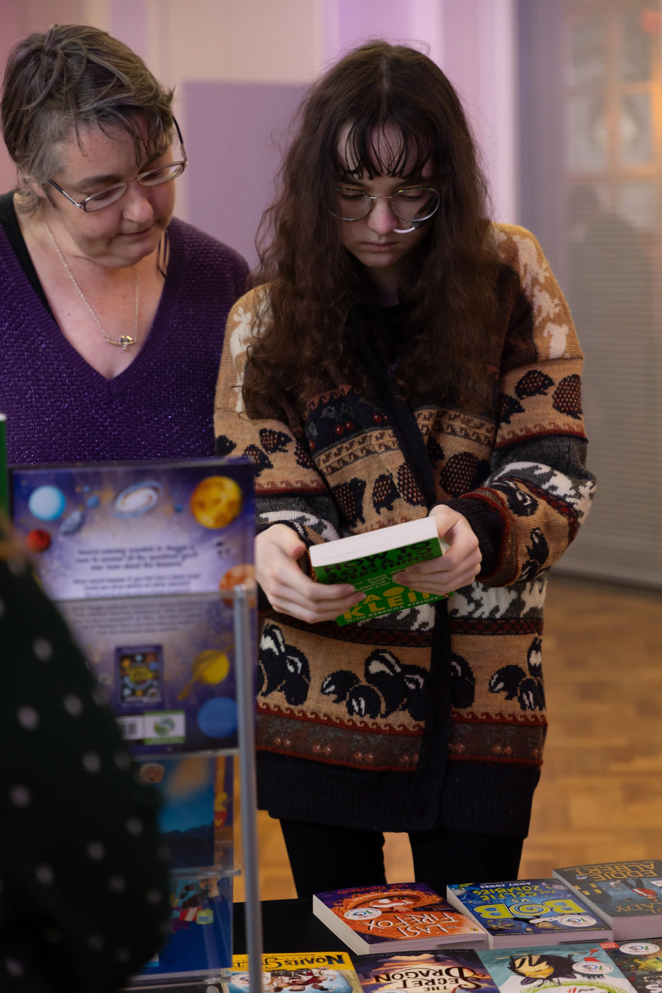 Bobby, MHS and mum looking at book.jpg
