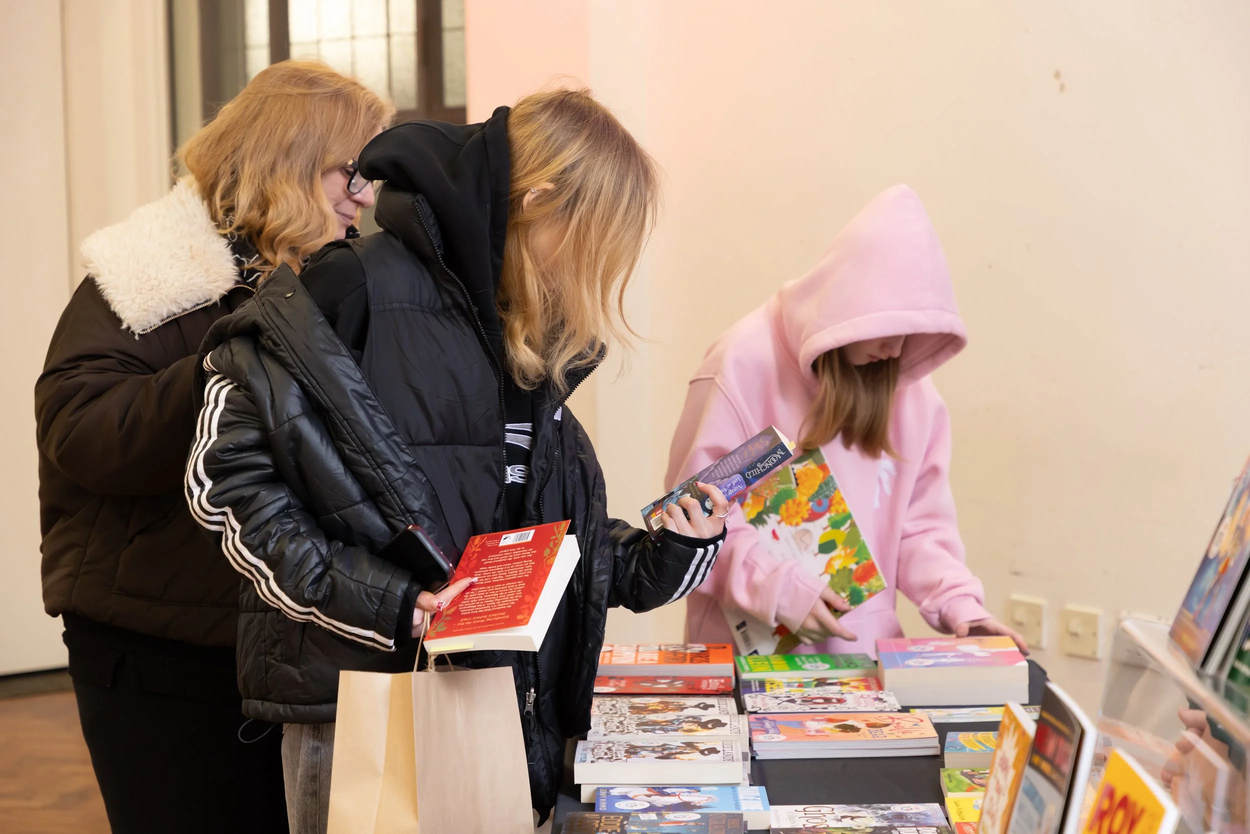 Millie, Inscape House and teachers looking at books.jpg