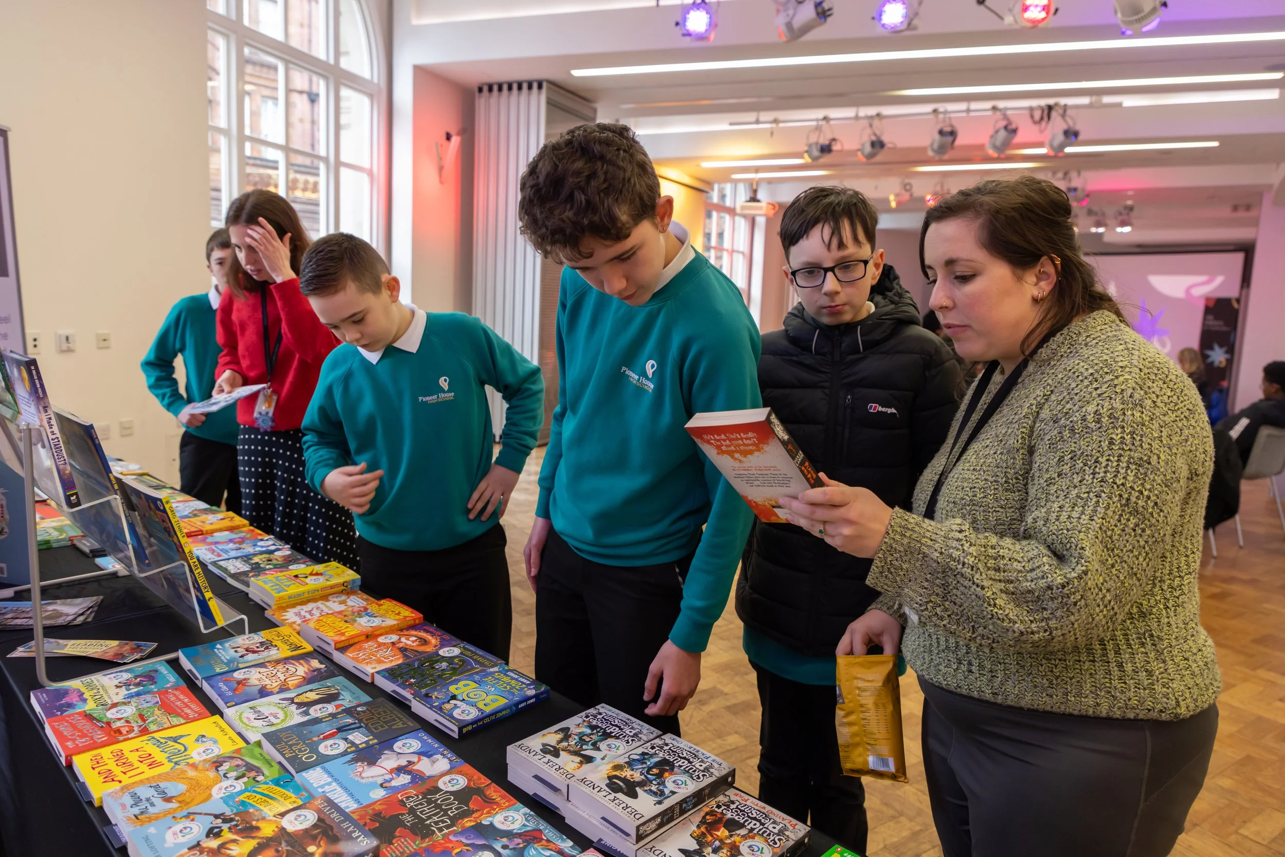 Pioneer House choosing books.jpg