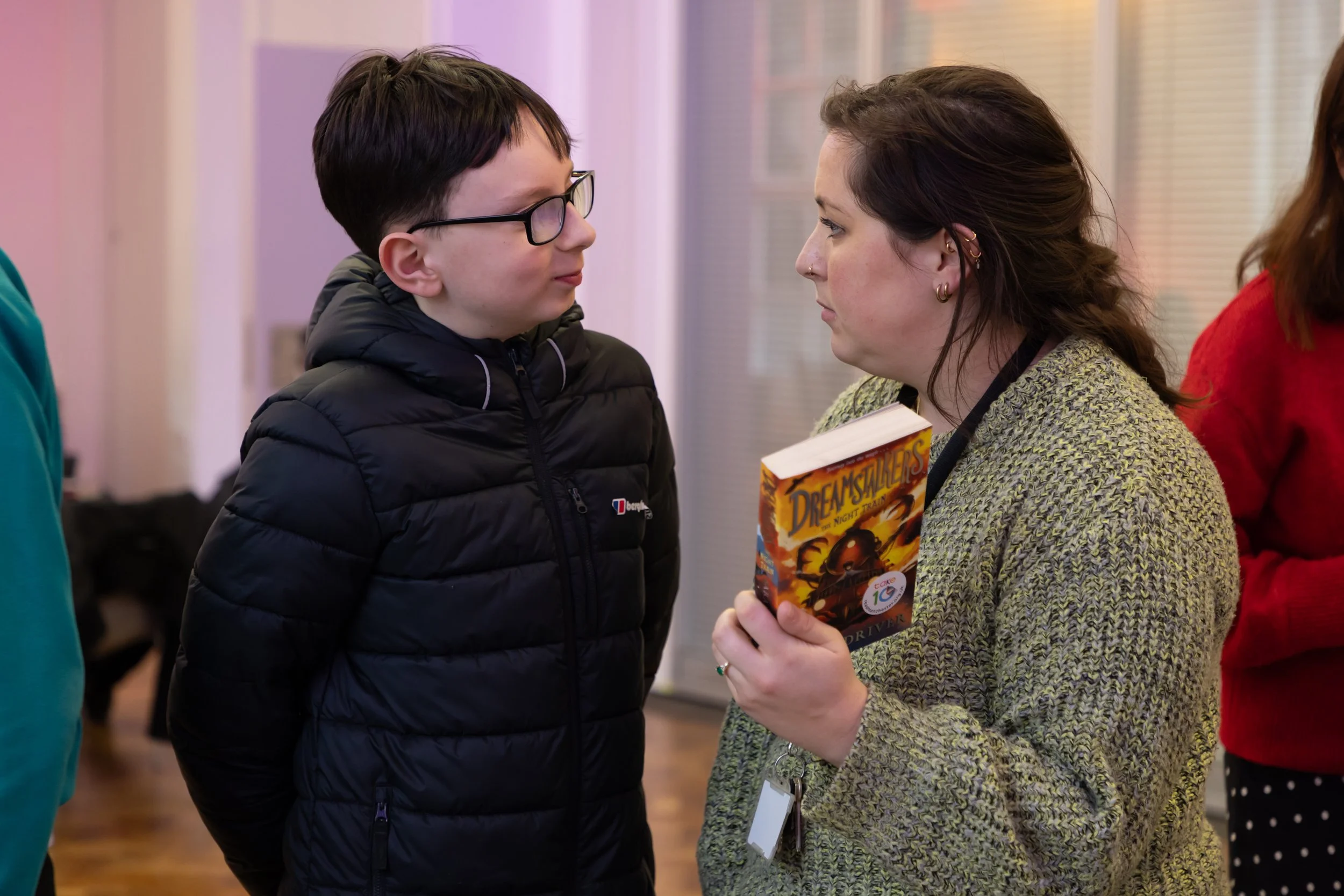 Pioneer House student at Sophie with book.jpg