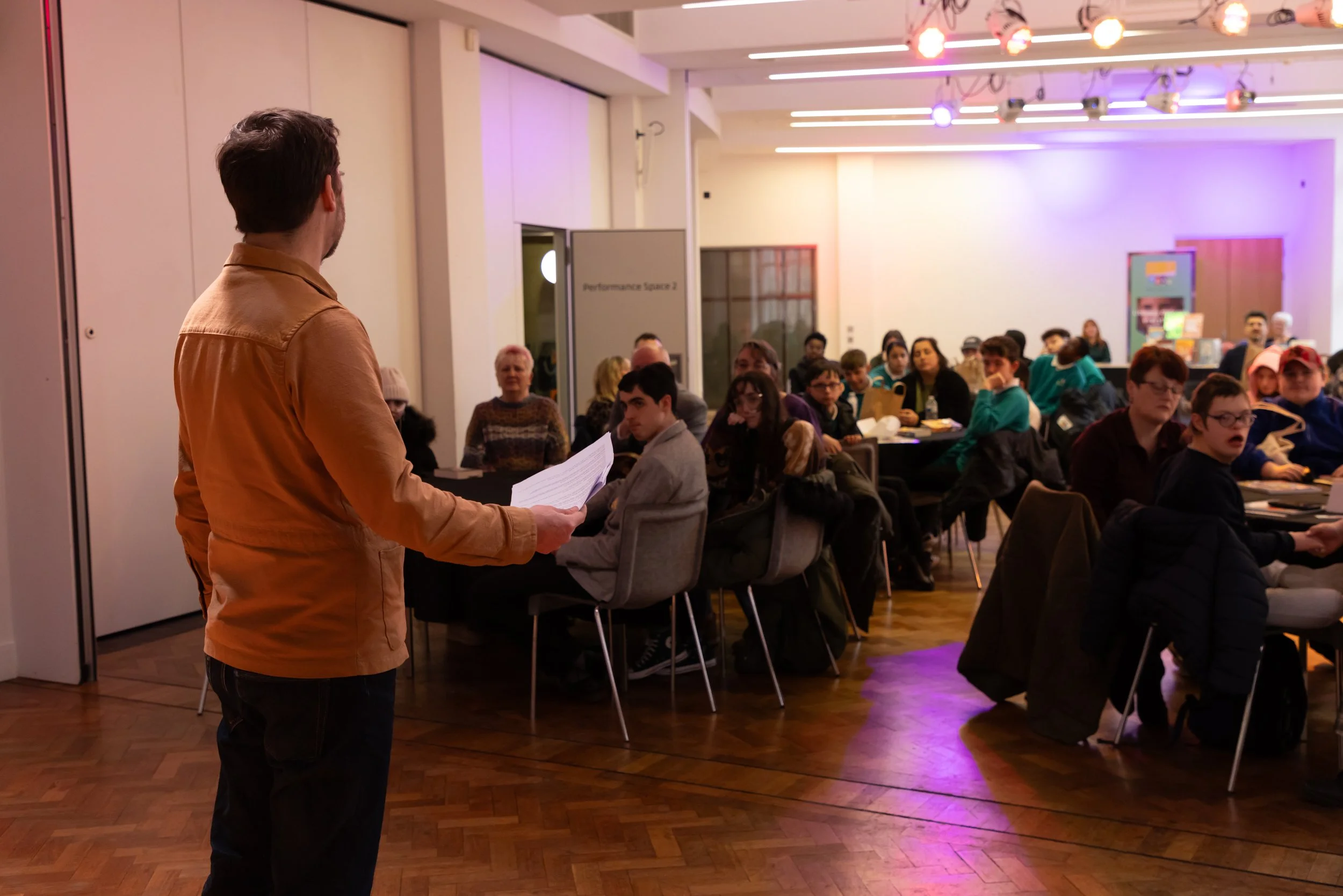 Oliver East from behind, showing full room.jpg