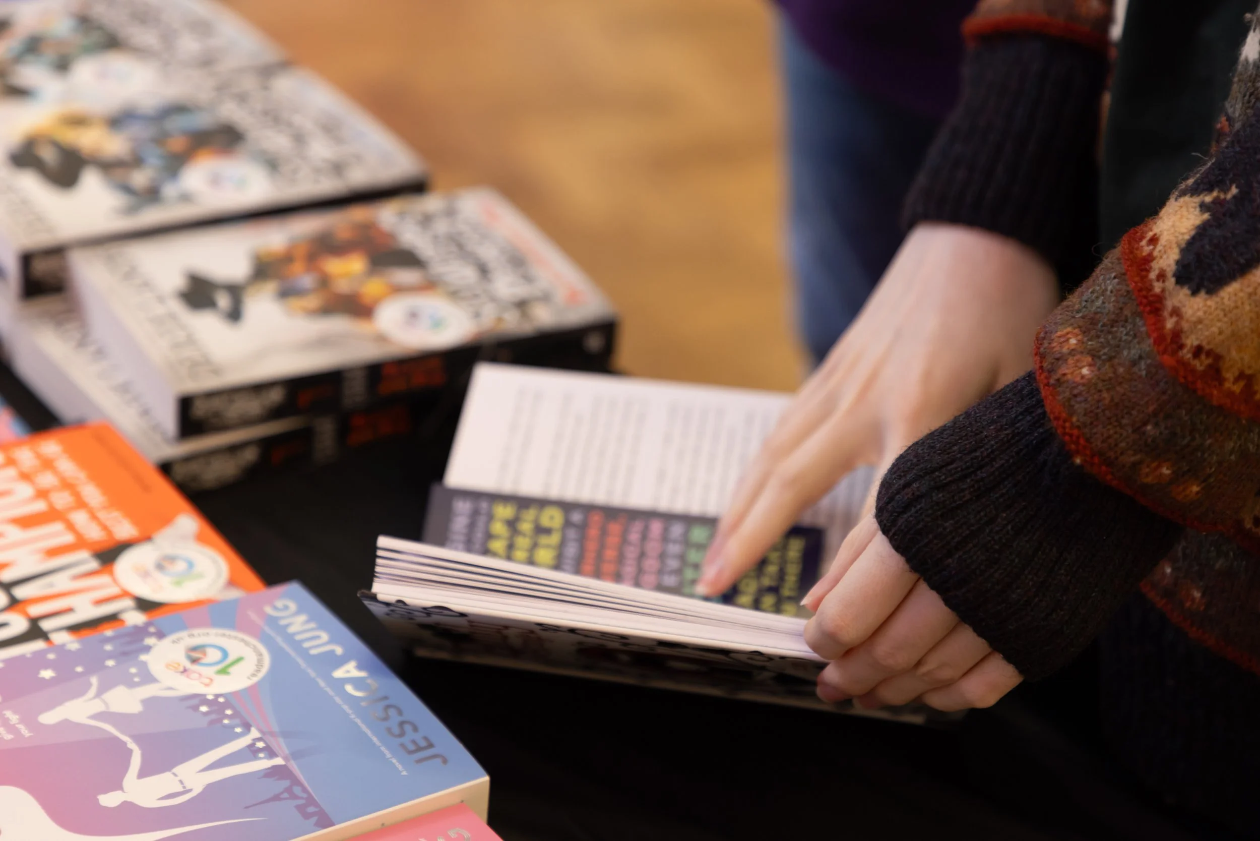 Hands looking at book.jpg