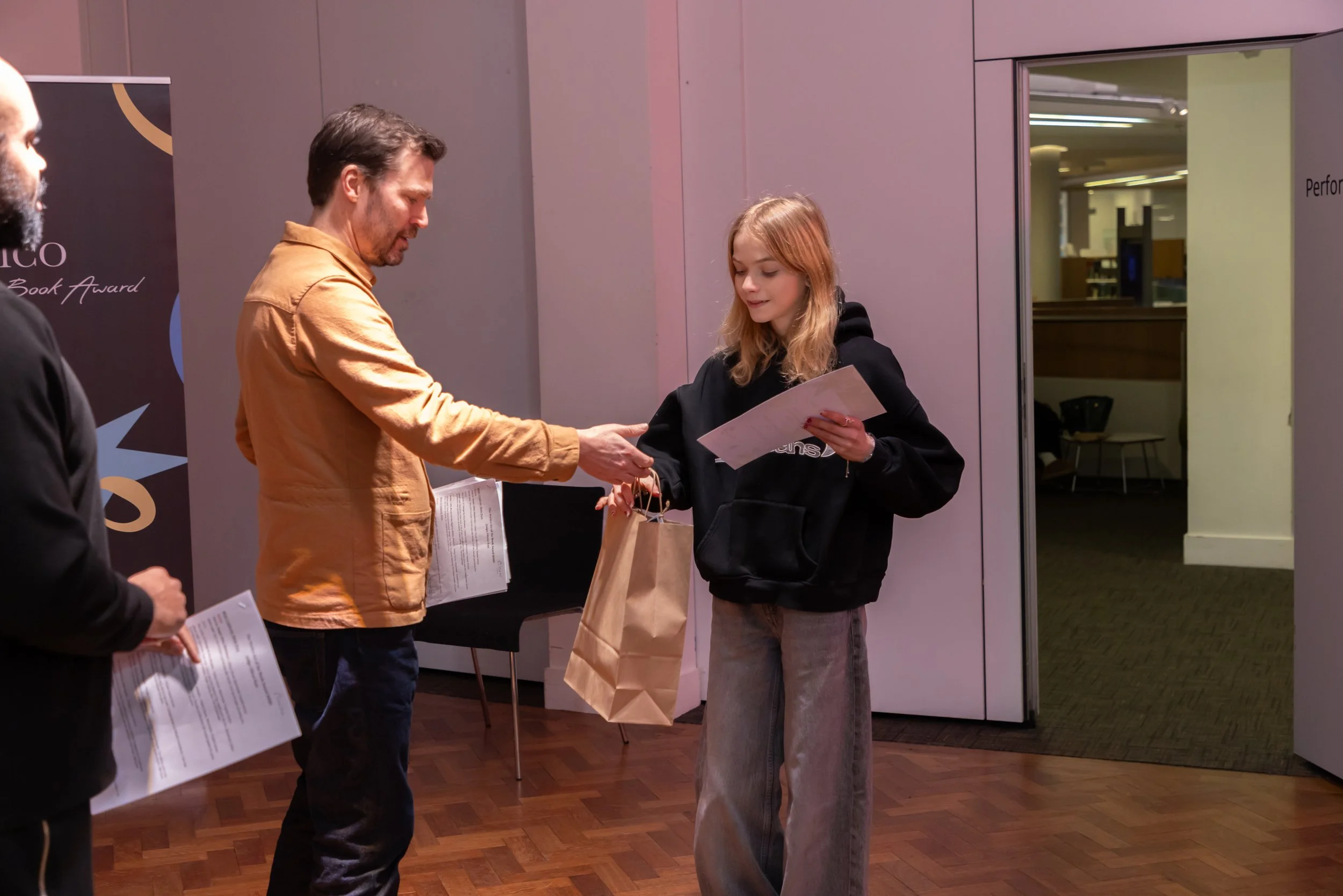 Amy accepting gift bag with OE MHS.jpg