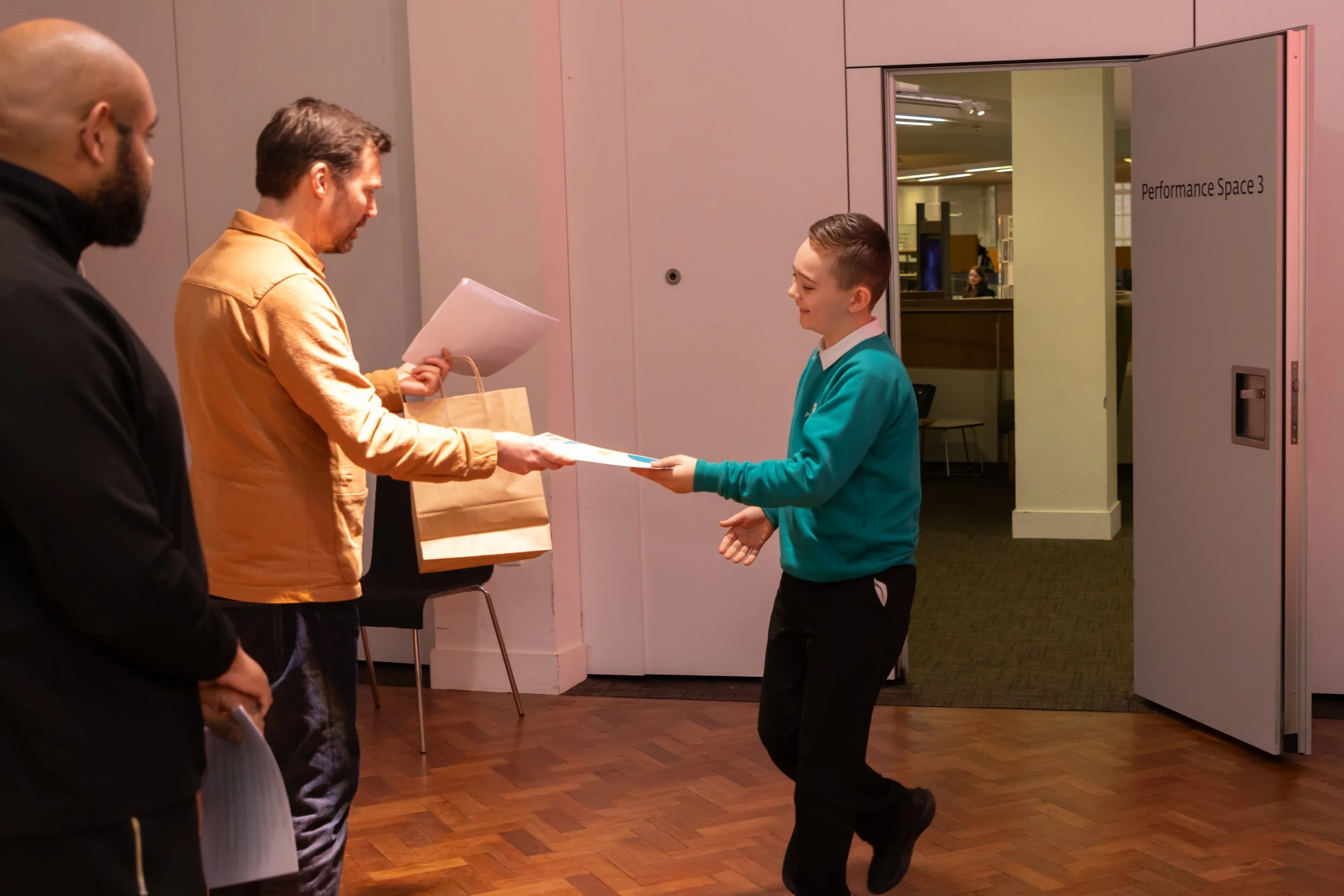 Louie PHS taking certificate from OE.jpg