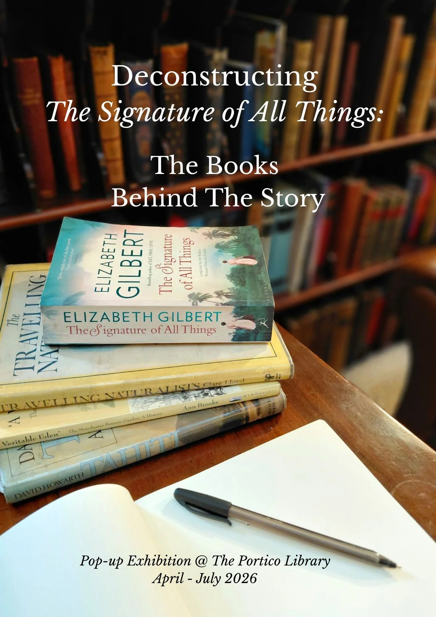 A pile of books with a pen and notebook