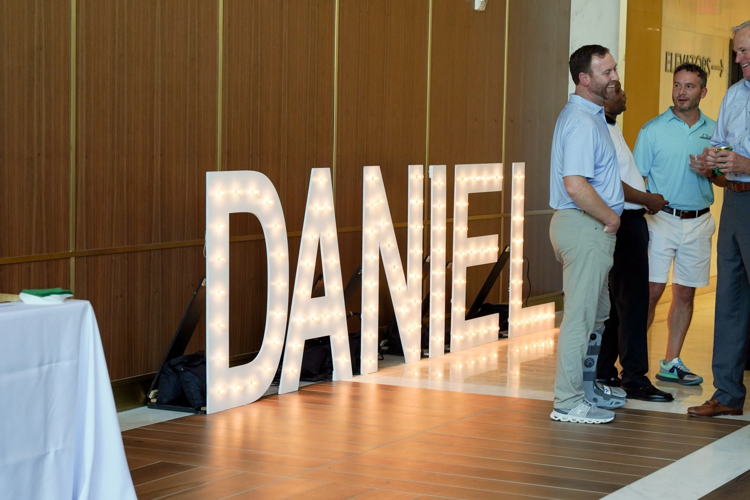 Daniel-RibbonCutting-04.jpg