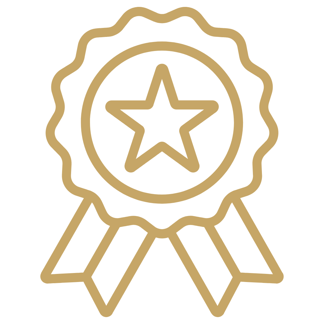 Gold award ribbon with a star in the center and two ribbons hanging down.