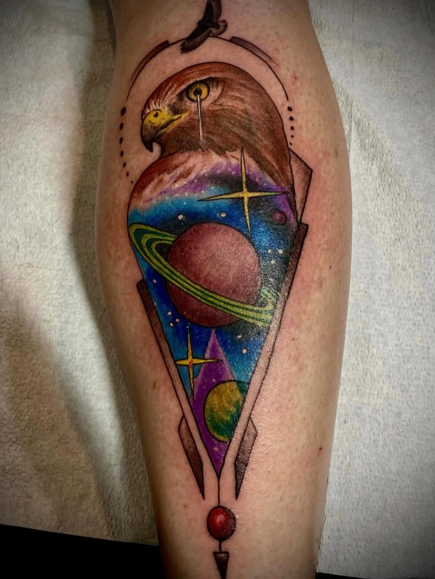 Space hawk *squa!!!* tattooed by @chrisevanstattoo