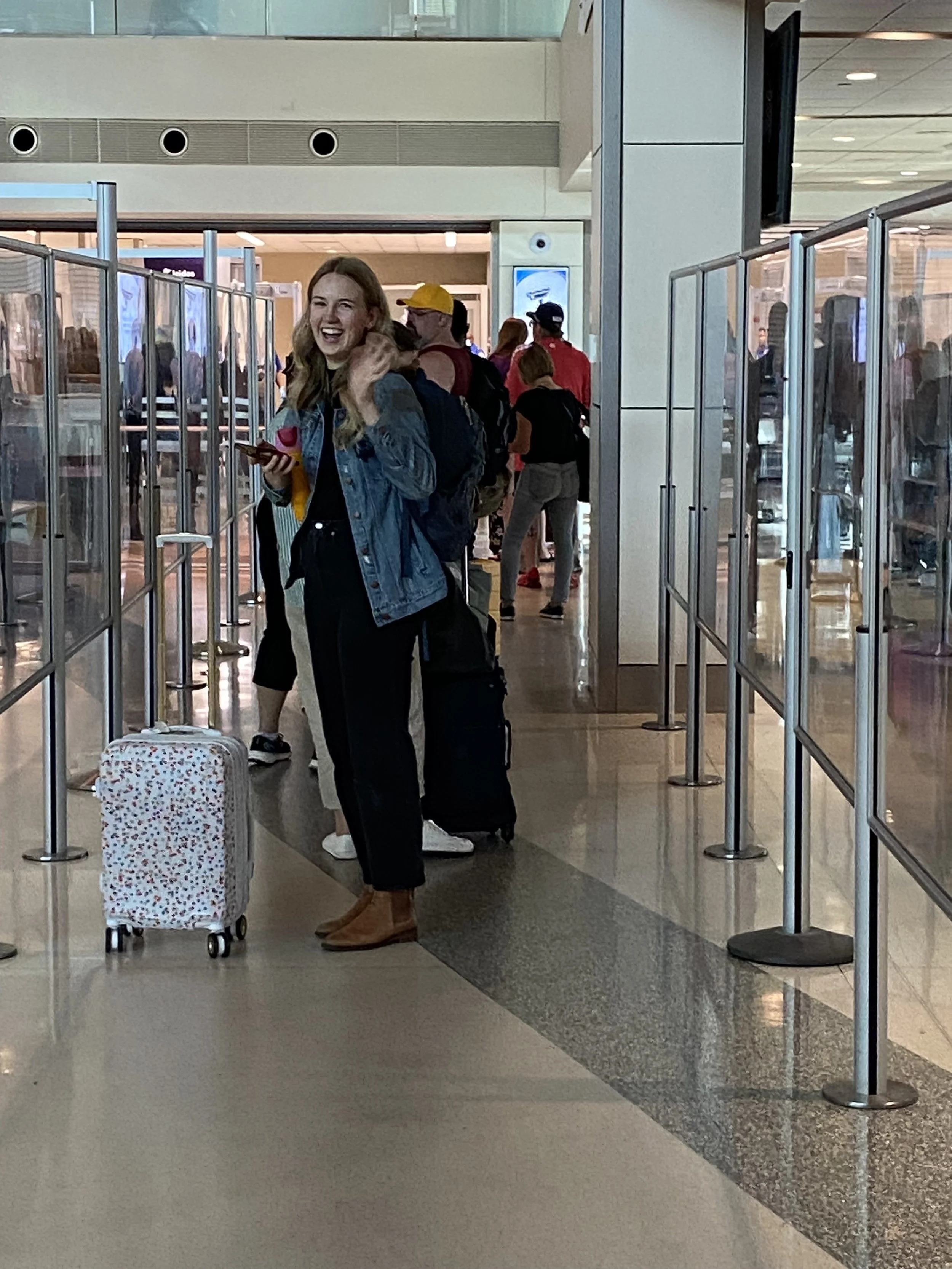 October 4th - waving bye to Mom and Dad in the airport!