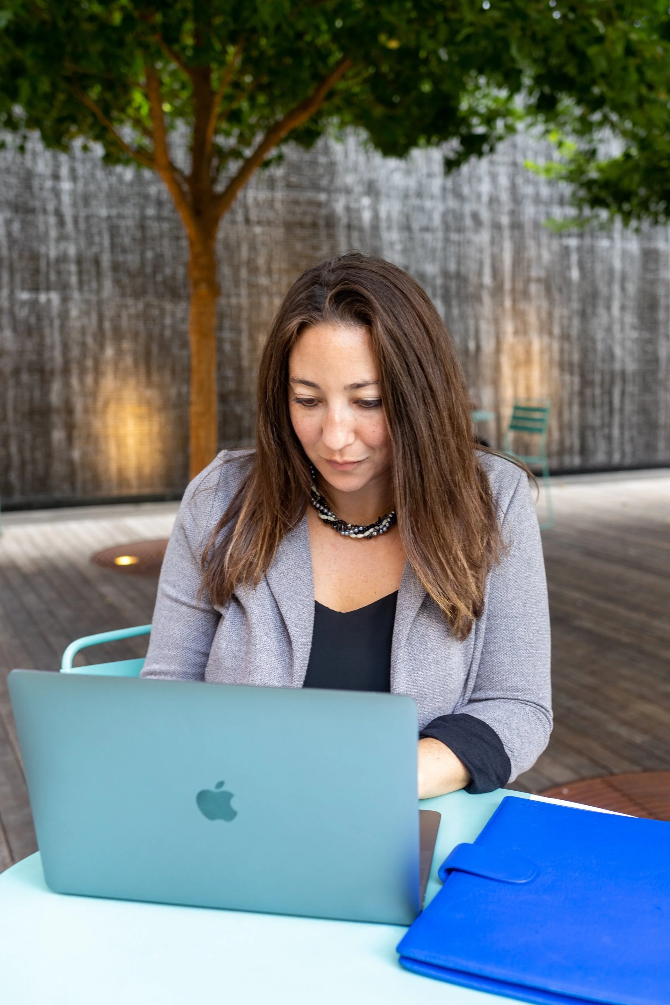 Susan Kahan preparing a fundraising assessment on a computer