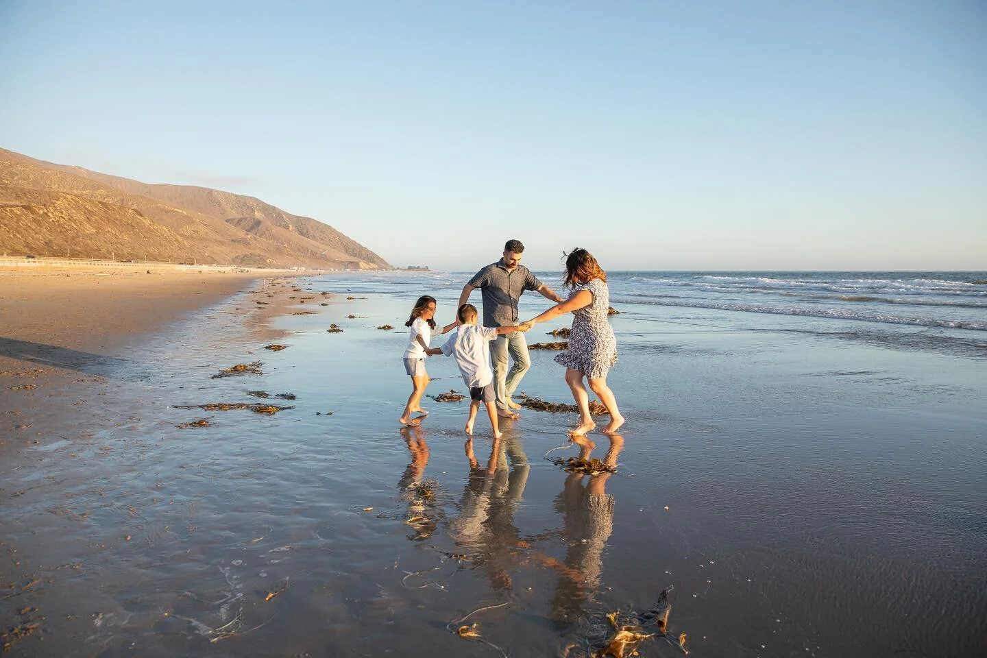 The sweetest family session at the beach, twirling and loving on one another. 🌀

I absolutely love when clients forget they&rsquo;re having their photo taken, and just live in the moment. 🤍