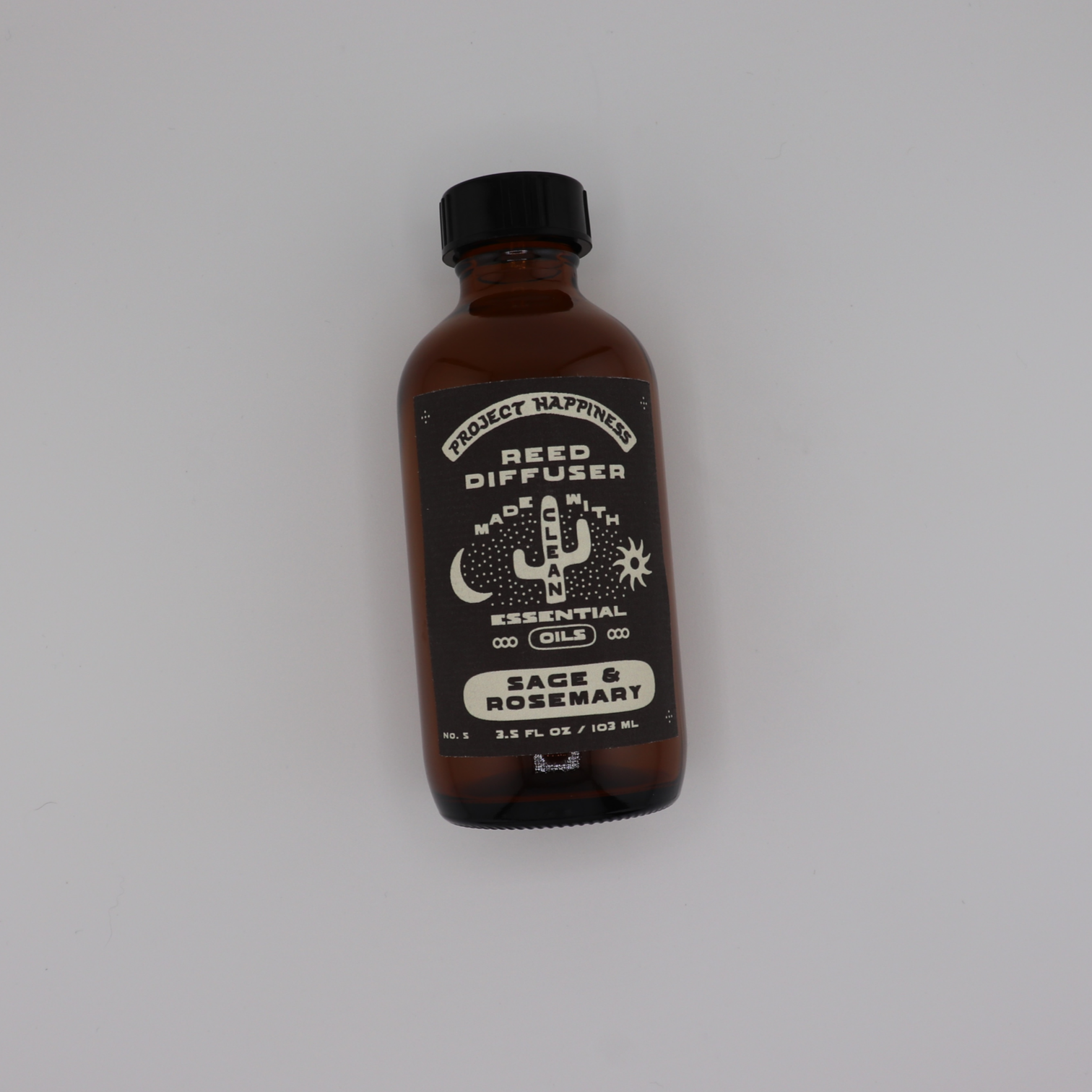 Sage & Rosemary Reed Diffuser in an amber glass bottle with black reeds, featuring fresh herbal notes of sage, rosemary, eucalyptus, thyme, cedarwood, and moss. Lasts 3–4 months.