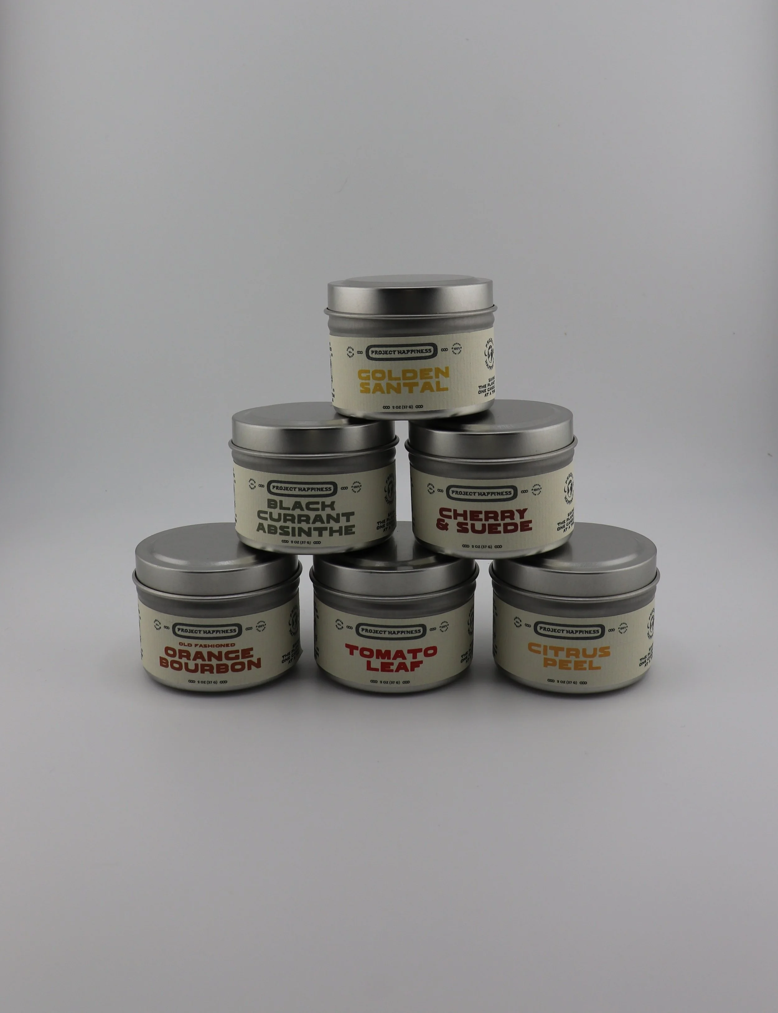 Apothecary Candle Kit with six 2 oz tin candles featuring herbal, citrus, fresh, sweet, and luxury-inspired fragrances. Each candle burns 10–20 hours.