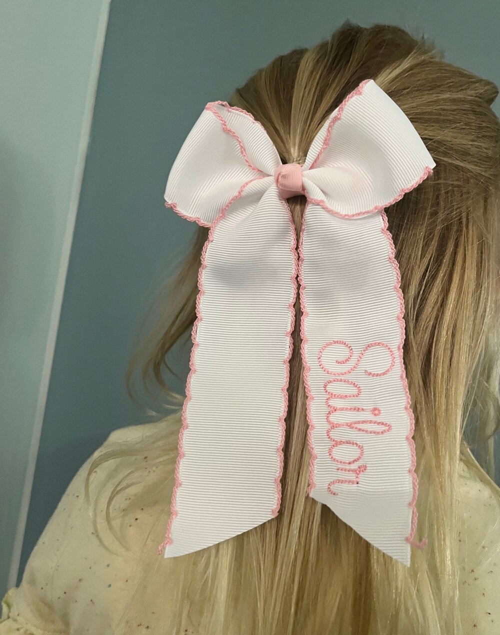 White Name on Light Pink Ribbon with Moonstitch – A Girl and Two Bows