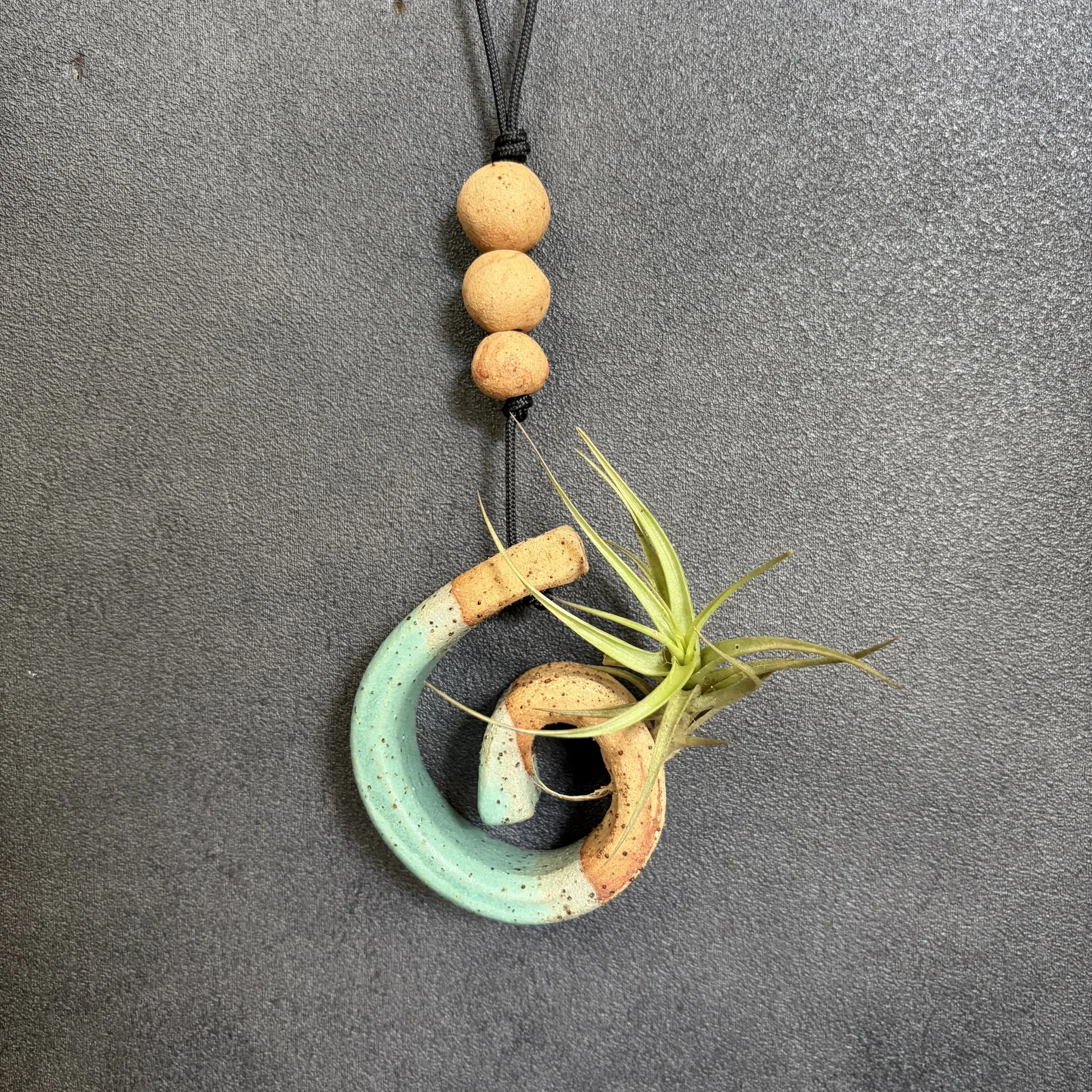 small koru planter . 874