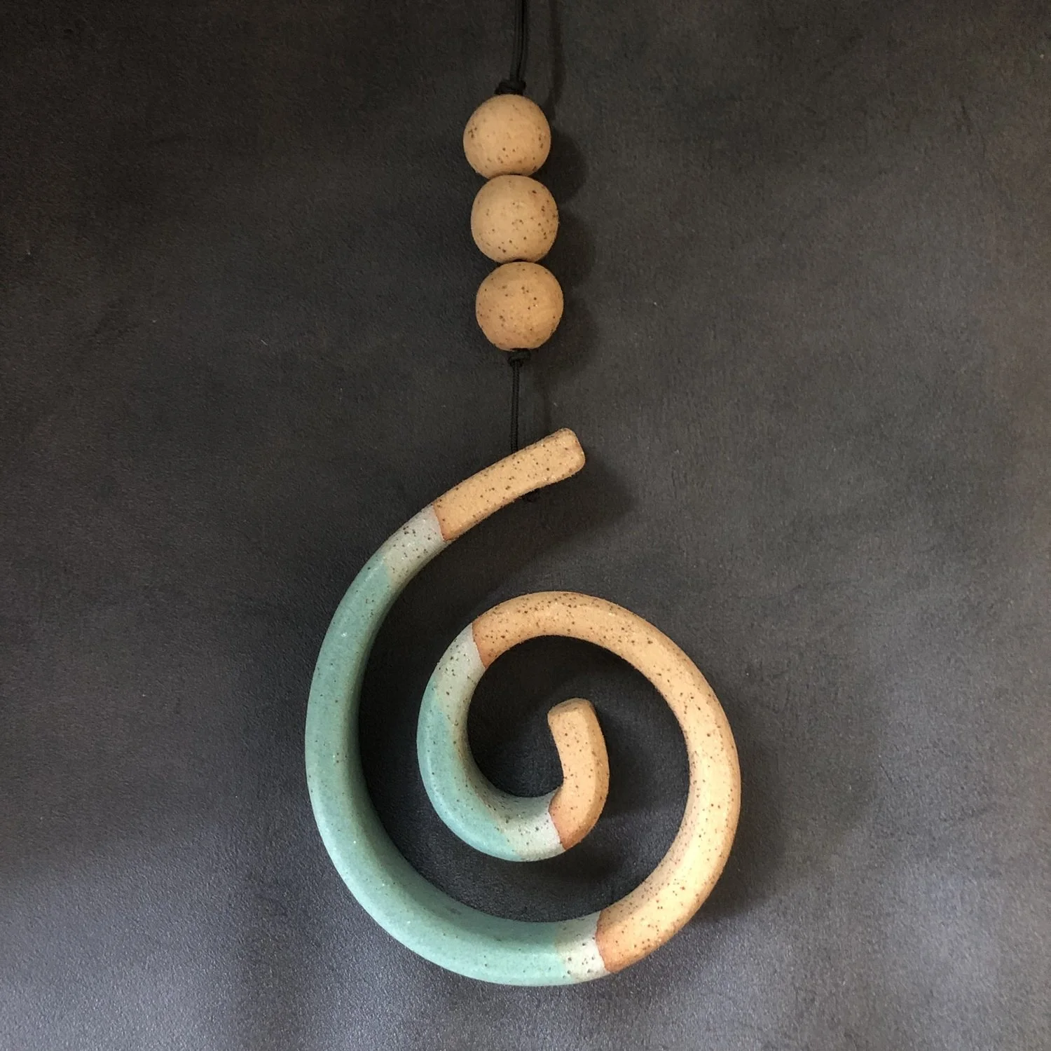 large hanging koru . 695