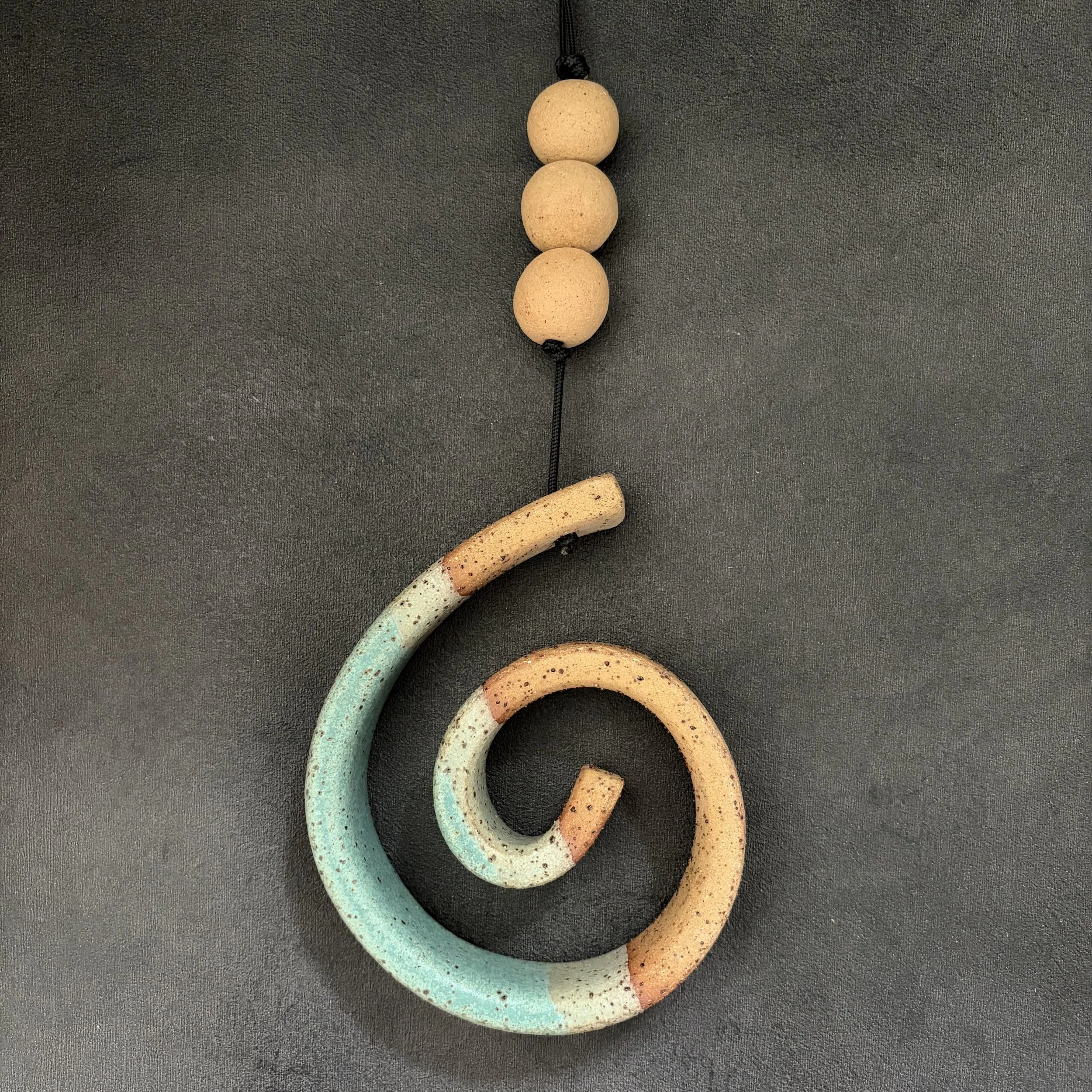 medium hanging koru . 815