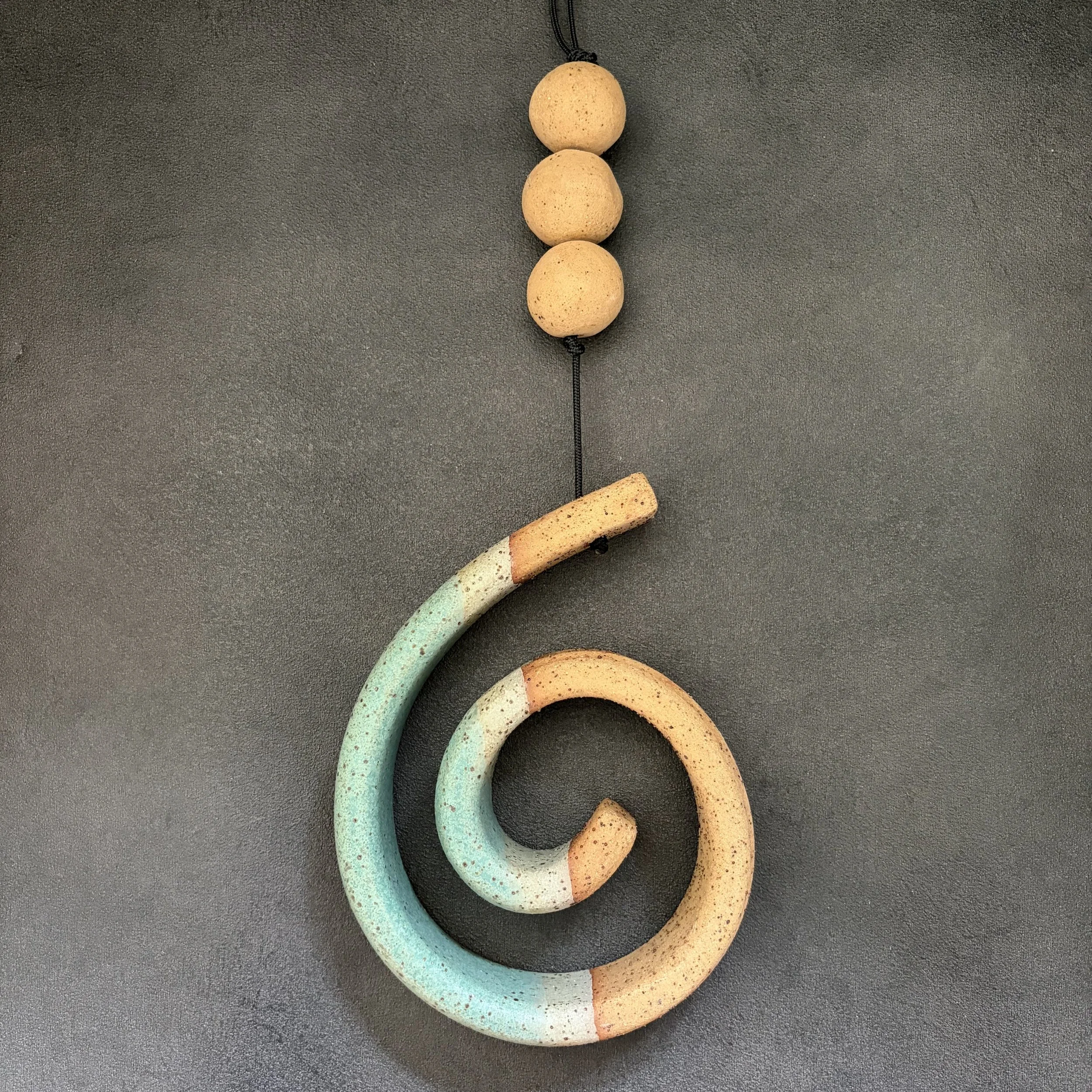 large hanging koru . 814