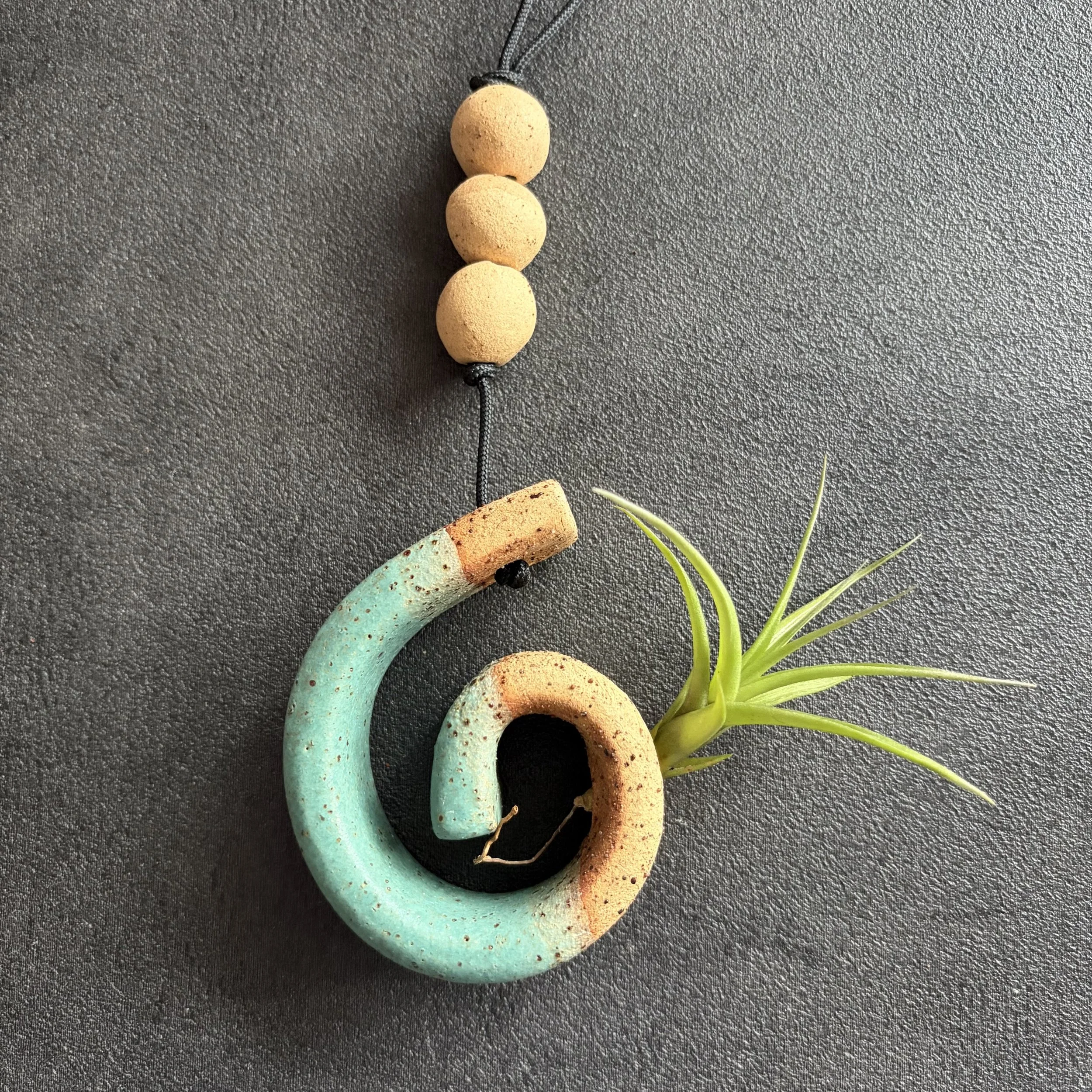 mini koru planter . green