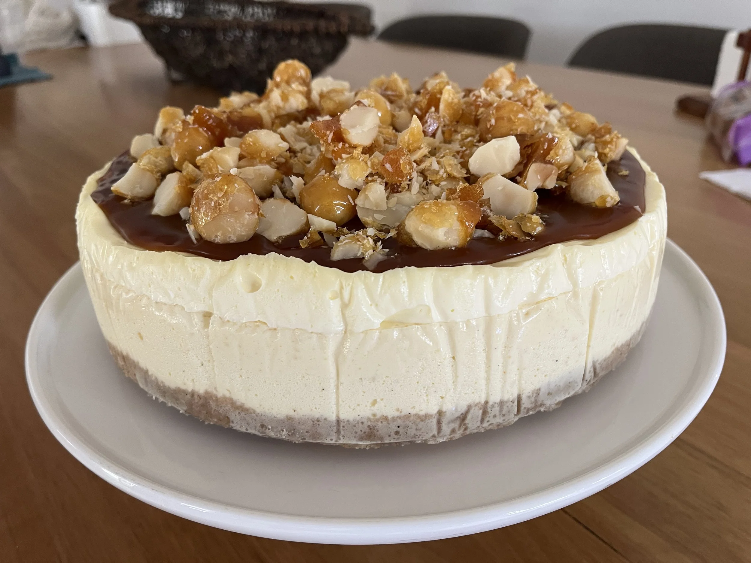 baked cheesecake w/ salted caramel + macadamia brittle