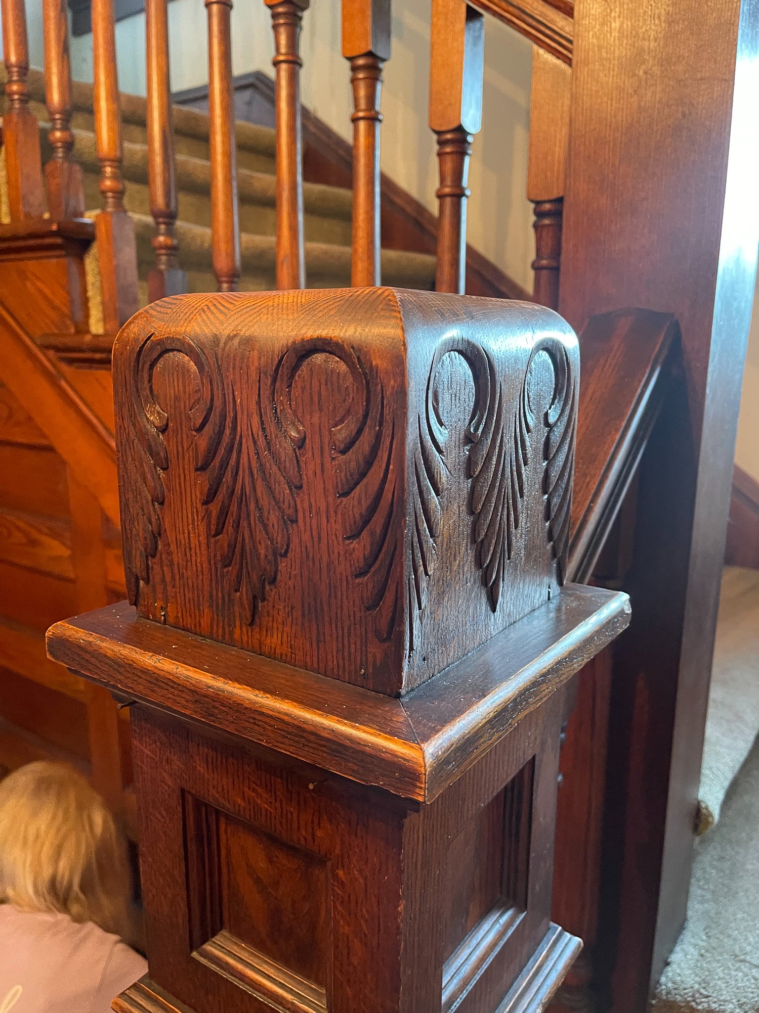 Here's a close-up of a newel post.  Handcarved gorgeousness!