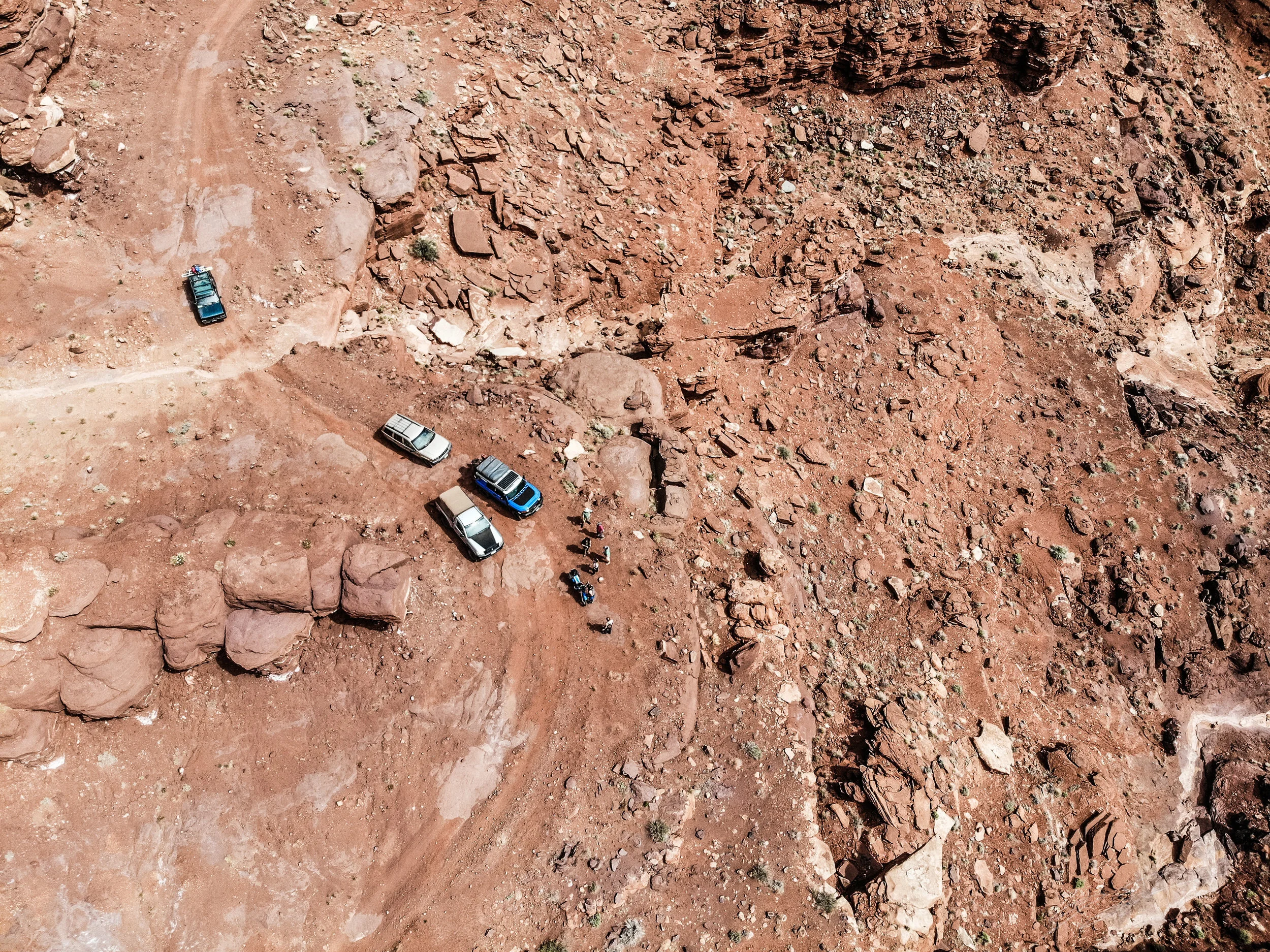 A near vertical drop from our perspective on the ground.