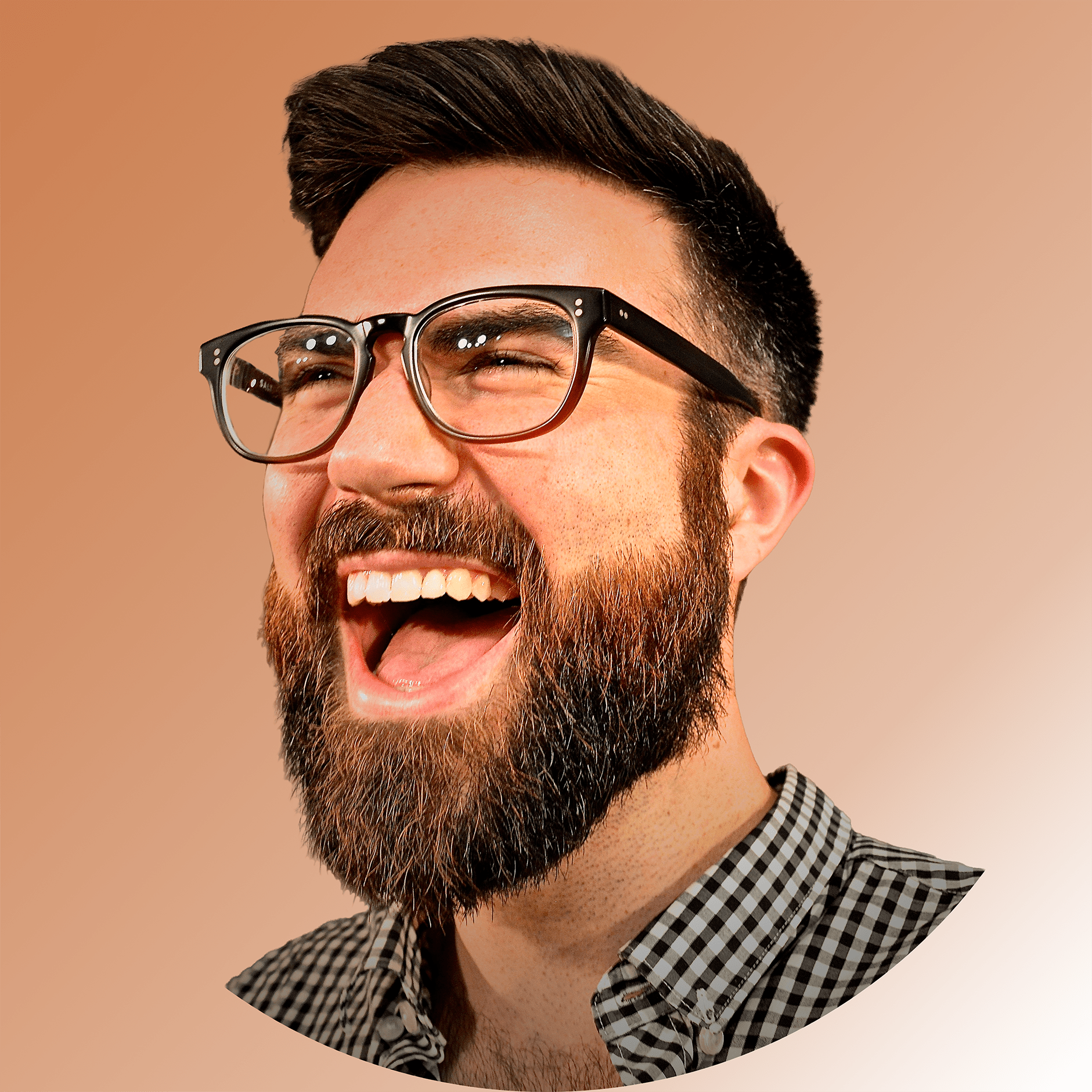 Close-up of Dane Crozier, a smiling man with a beard and glasses, wearing a checkered shirt, against a beige background. That's Dane.