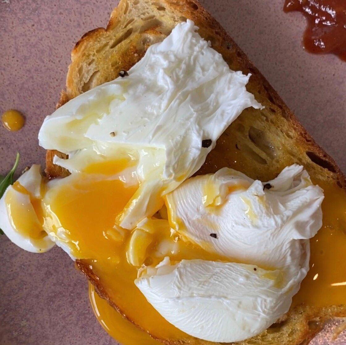 K.I.S.S. 

We're talking about simple things. Done really well. 

Organic farm laid eggs, poached to perfection. On our range of toast options with your choice of sides. 

IYKYK. It just works!